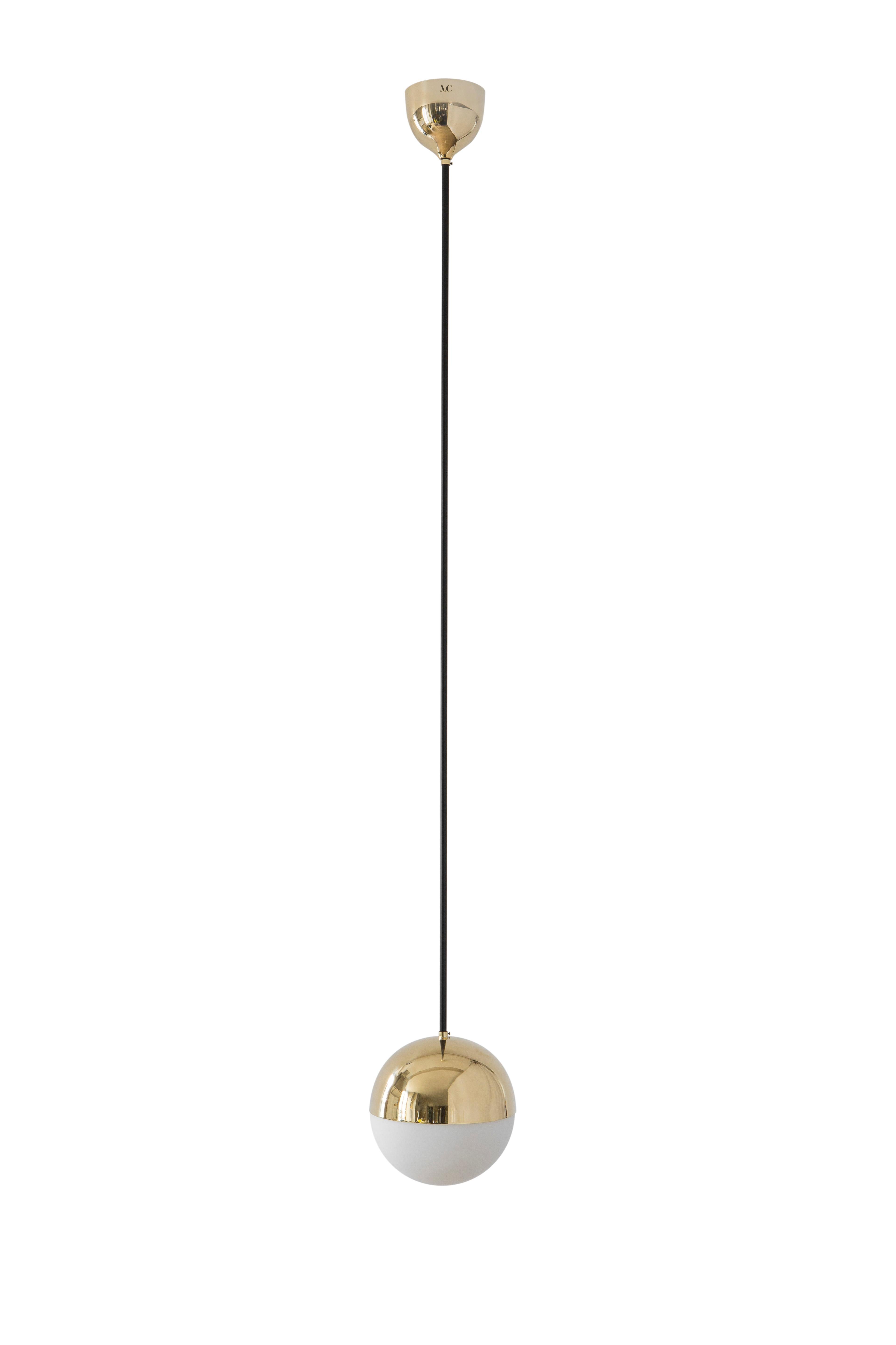 Pendant 01 by Magic Circus Editions.
Dimensions: D 25 x W 25 x H 190 cm, also available in H 110, 130, 150, 175 cm.
Materials: brass, mouth blown glass.

All our lamps can be wired according to each country. If sold to the USA it will be wired
