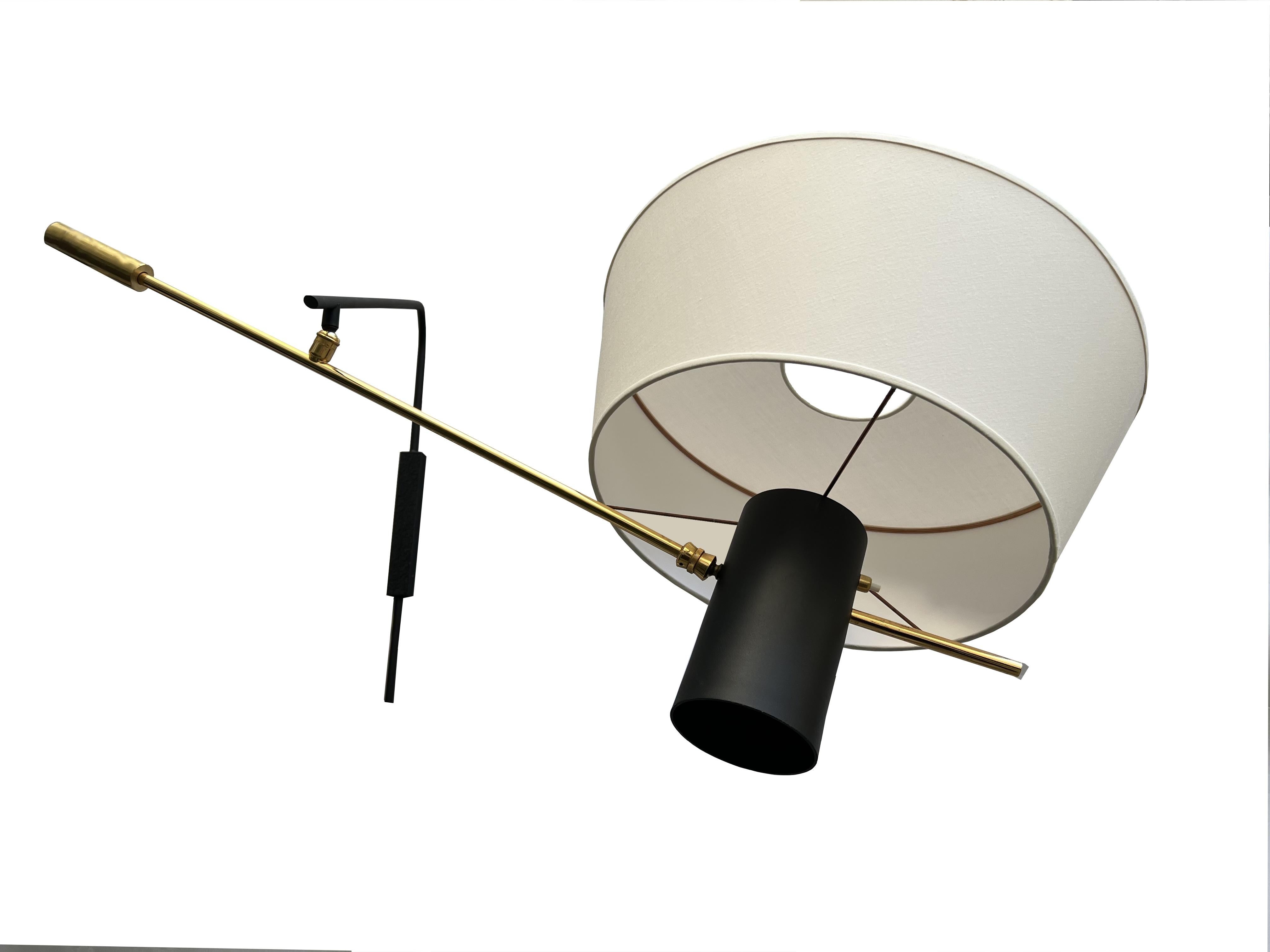 Mid-20th Century Large pendulum wall lamp with inverted shade Maison Lunel, France, circa 1960 For Sale