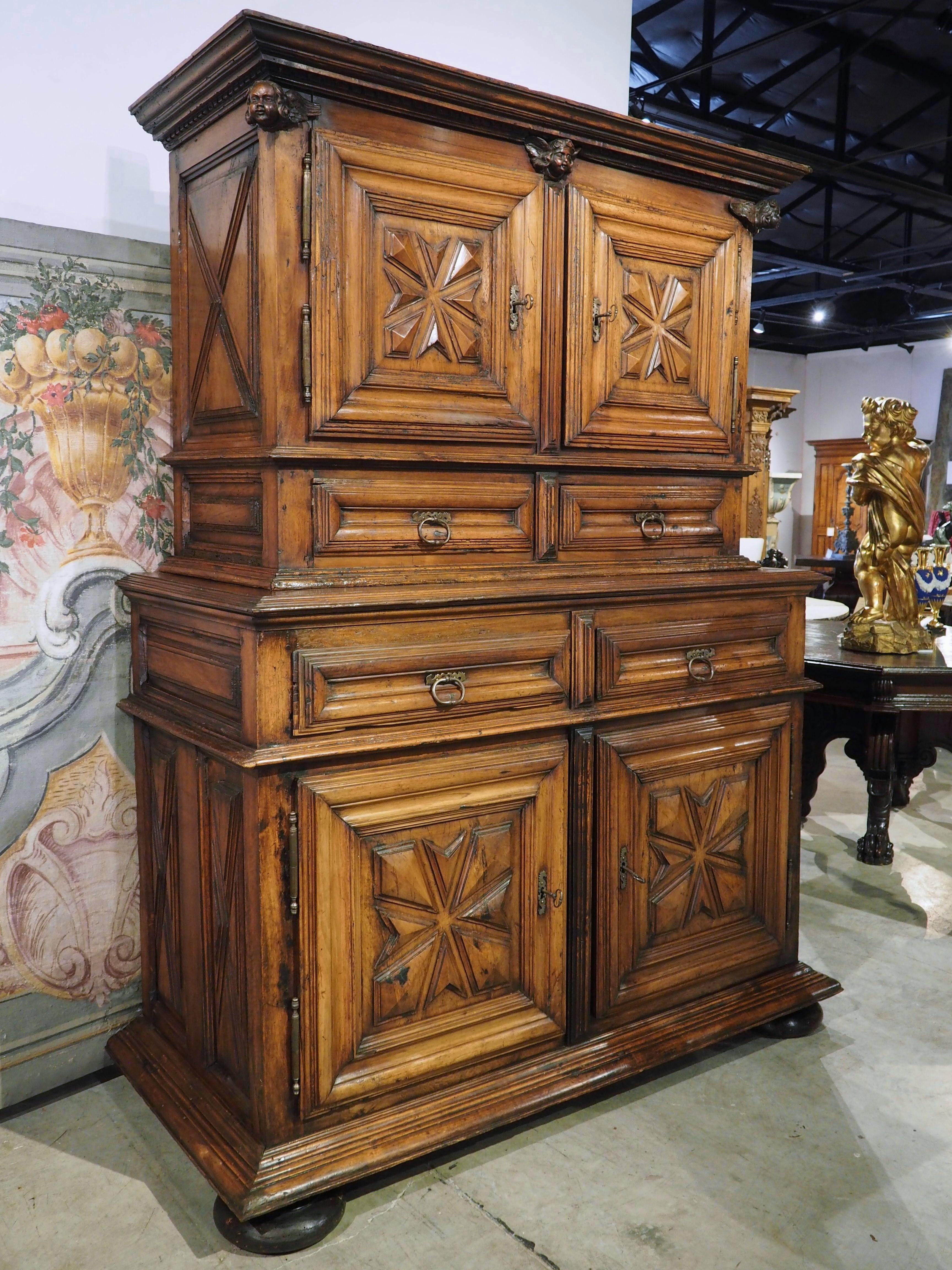 During the 1600’s, buffet deux corps were preferred pieces of furniture in French homes. These two-bodied cabinets allowed for storage of fine serving pieces and linens in kitchens or dining rooms.

Deux corps, such as ours, that were produced