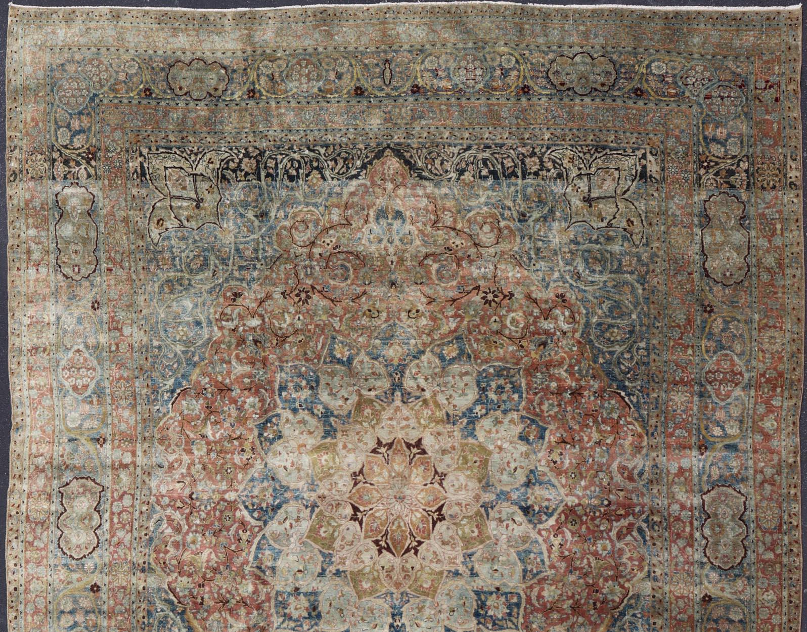 Large antique Persian Mashhad carpet with colorful floral and medallion design. Persian Mashhad floral design. Keivan Woven Arts / rug 17-0602, country of origin / type: Iran / Mashhad, circa 1930 

Measures: 12'11 x 16'3 

Soft to the touch with