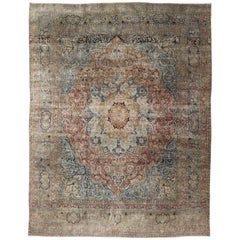 Grande tappeto persiano antico Mashad con disegni floreali e medaglioni colorati