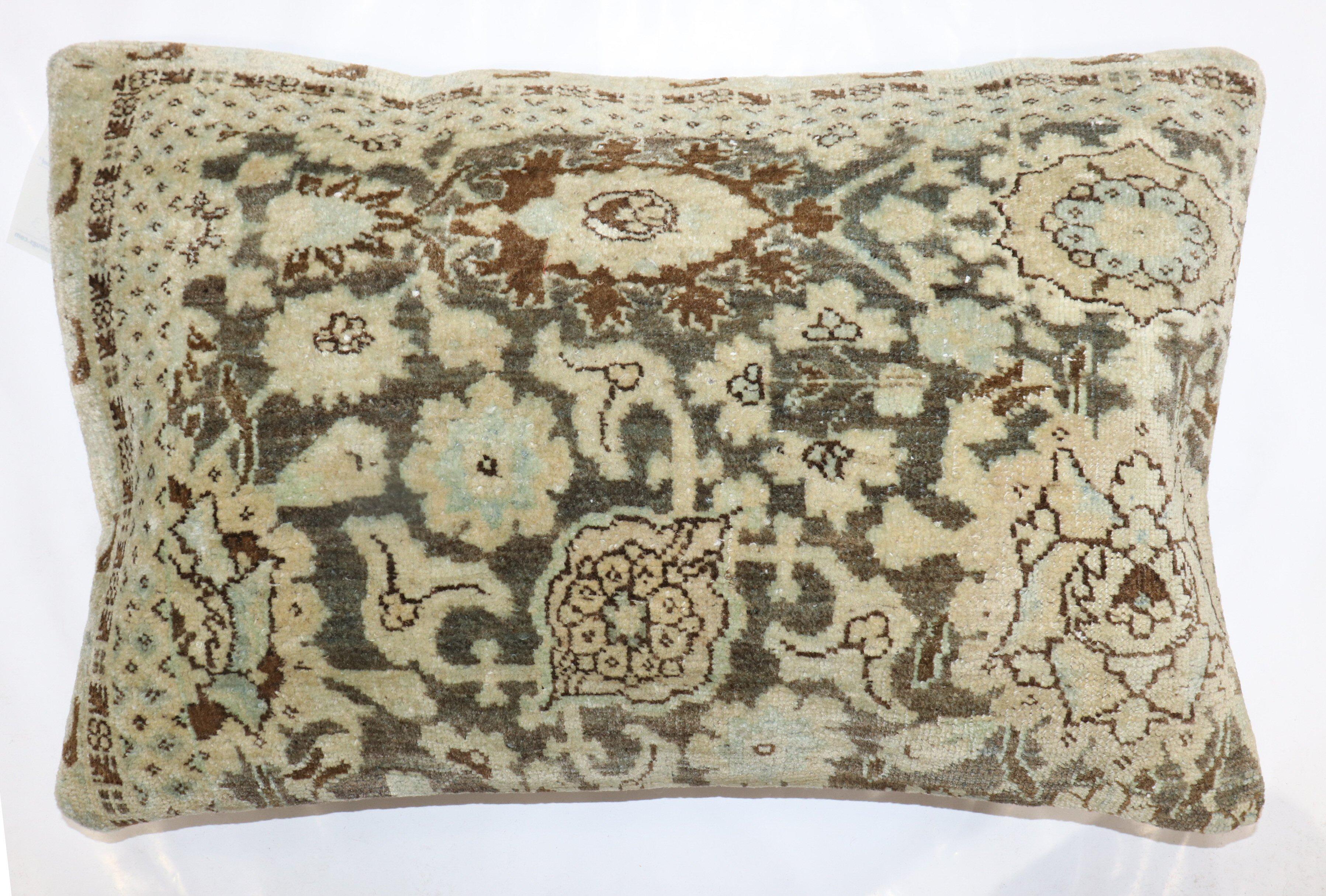 Large size pillow made from a Persian Lilihan rug. zipper closure and poly-fill insert provided.

Measures: 17'' x 27''.