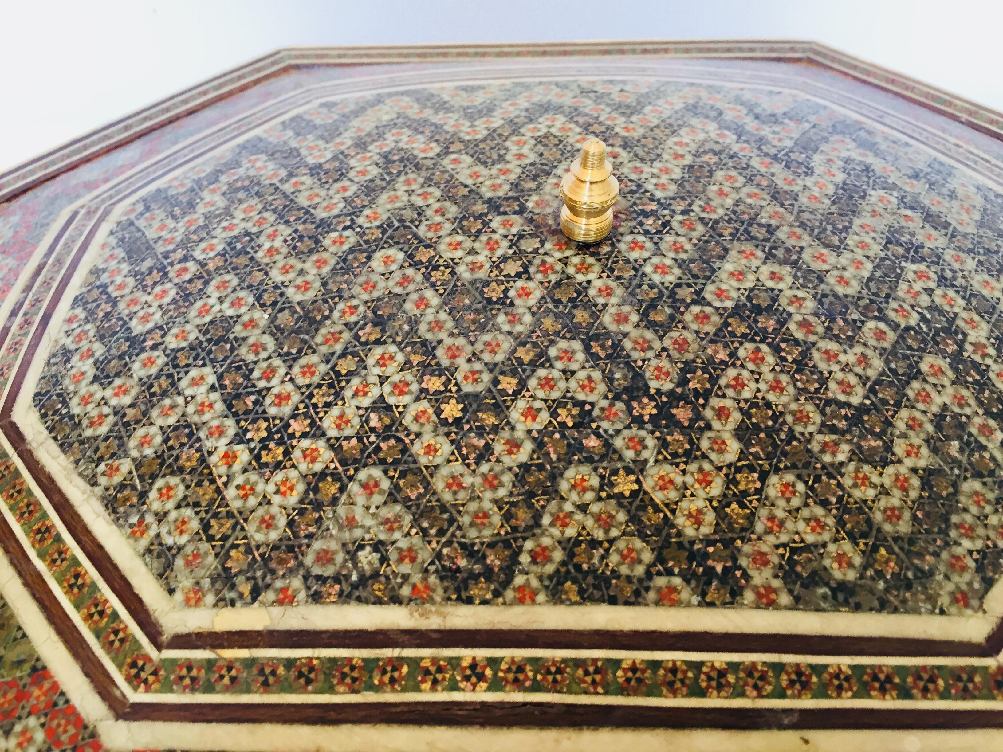 Large Persian micro mosaic inlaid jewelry box with lid.
Intricate inlaid box with floral and geometric Moorish design.
Micro mosaic designs in bone inlay and marquetry, very fine artwork.
Lined with red velvet.
Museum piece like the ones in