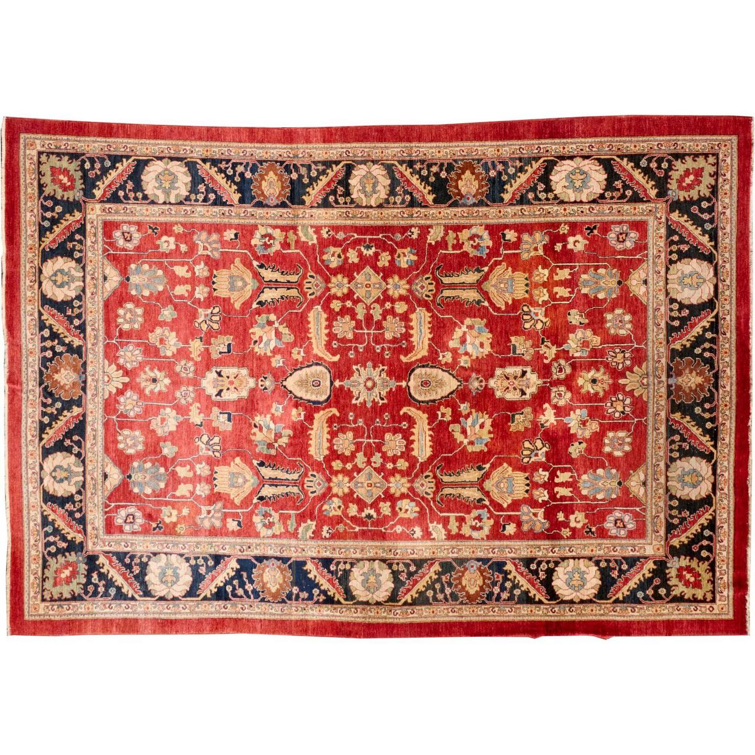 Gran alfombra persa de lana anudada a mano, campo rojo con borde azul marino, Mediados del S. XX en venta 2