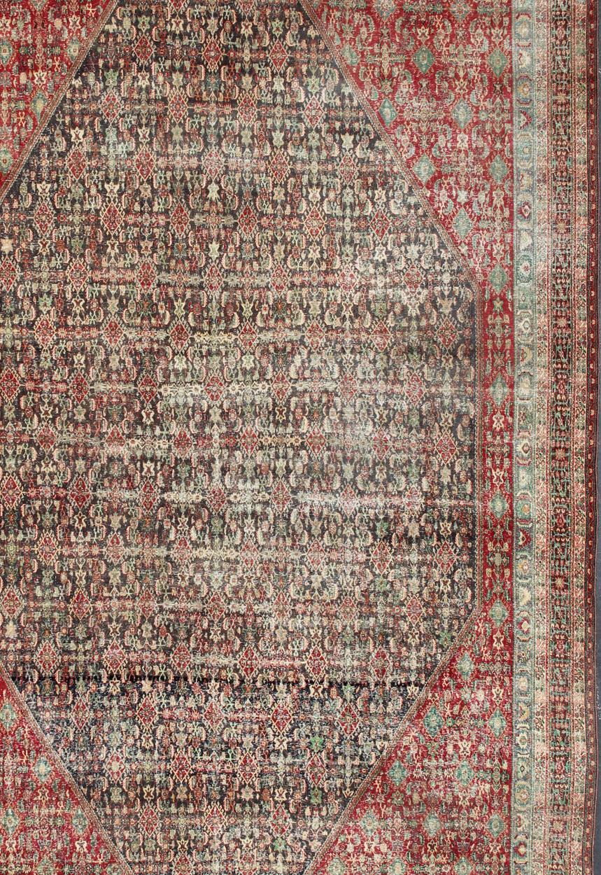 Hand-Knotted Colorful Large Persian Antique Qashqai rug with A Beautiful Tribal Motif Design For Sale