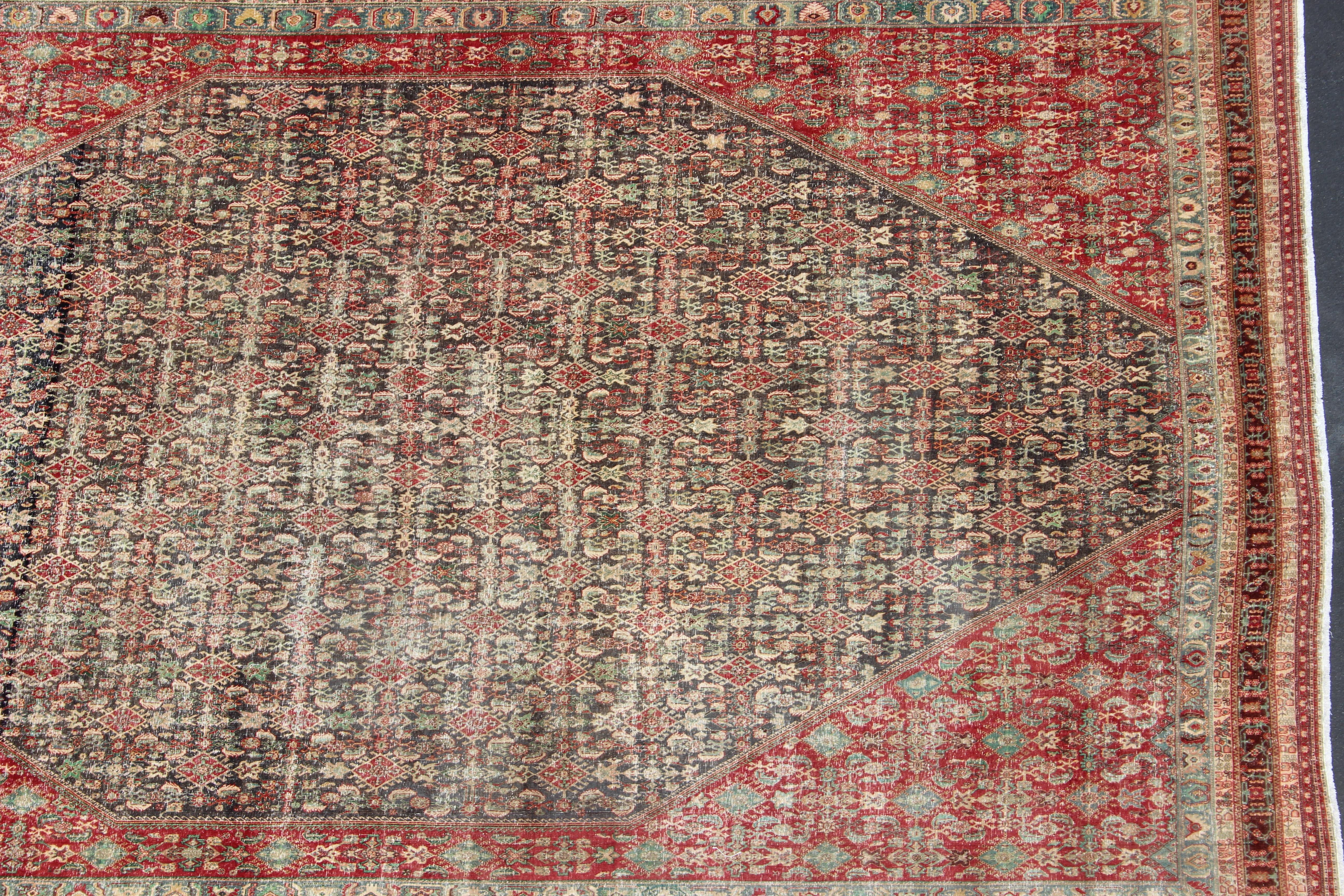 Wool Colorful Large Persian Antique Qashqai rug with A Beautiful Tribal Motif Design For Sale