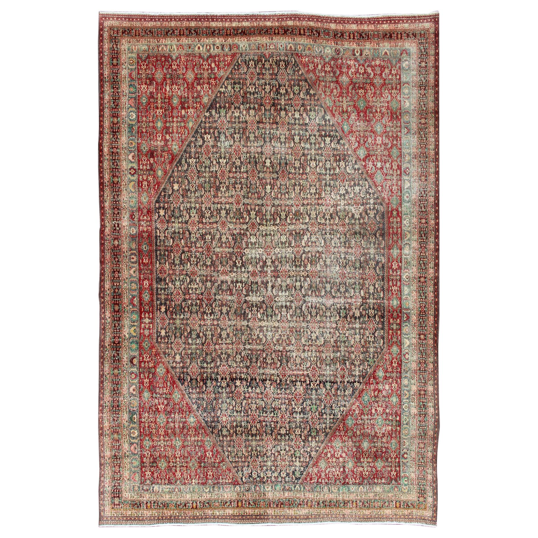 Colorful Large Persian Antique Qashqai rug with A Beautiful Tribal Motif Design For Sale
