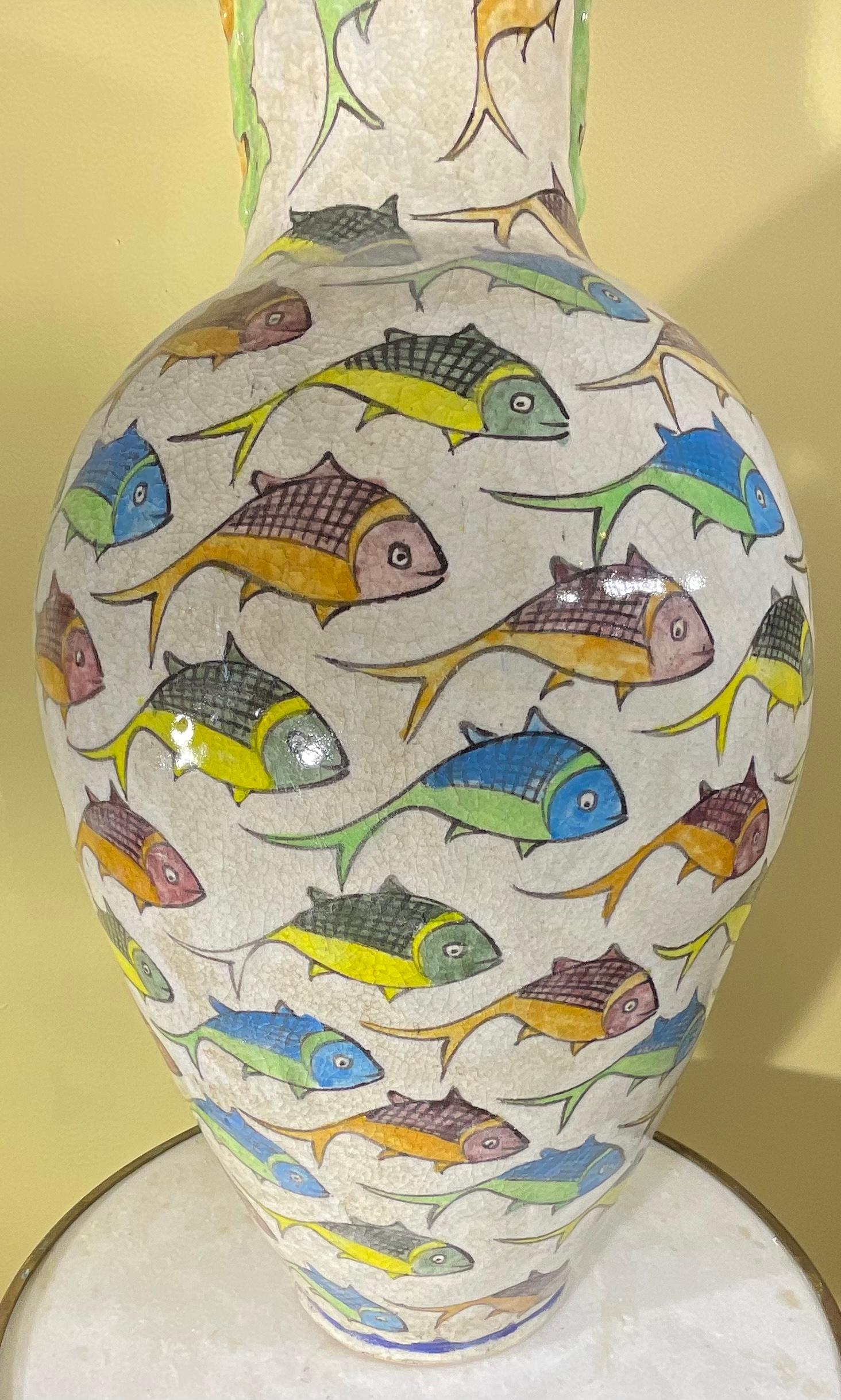 Beautiful Persian ceramic vase hand-painted and glazed with colourful fish motif surrounding on cream color background.
 Great object of art for display.