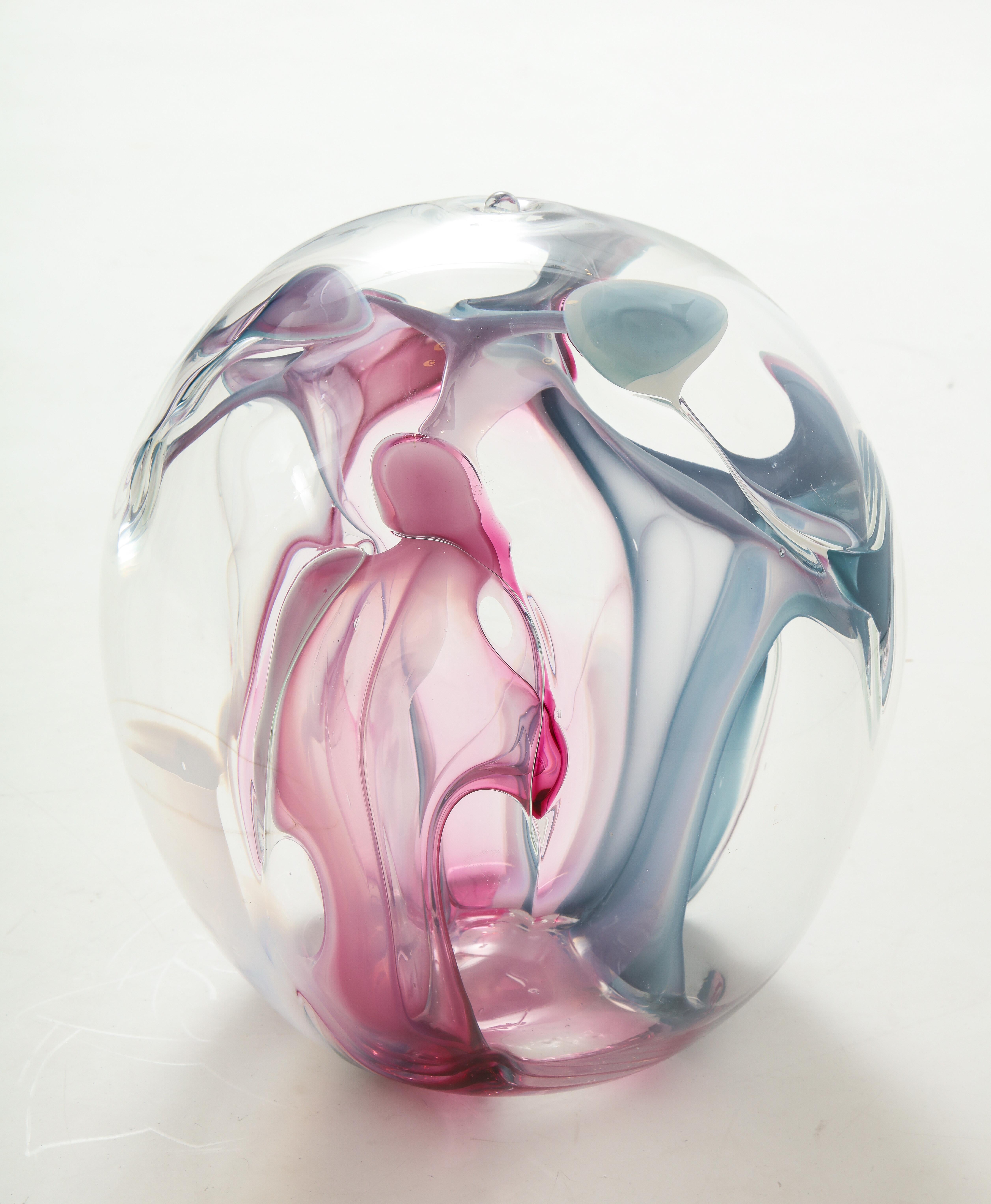 Large blown glass sculpture with internal swirling colored glass threads.
Signed and dated.