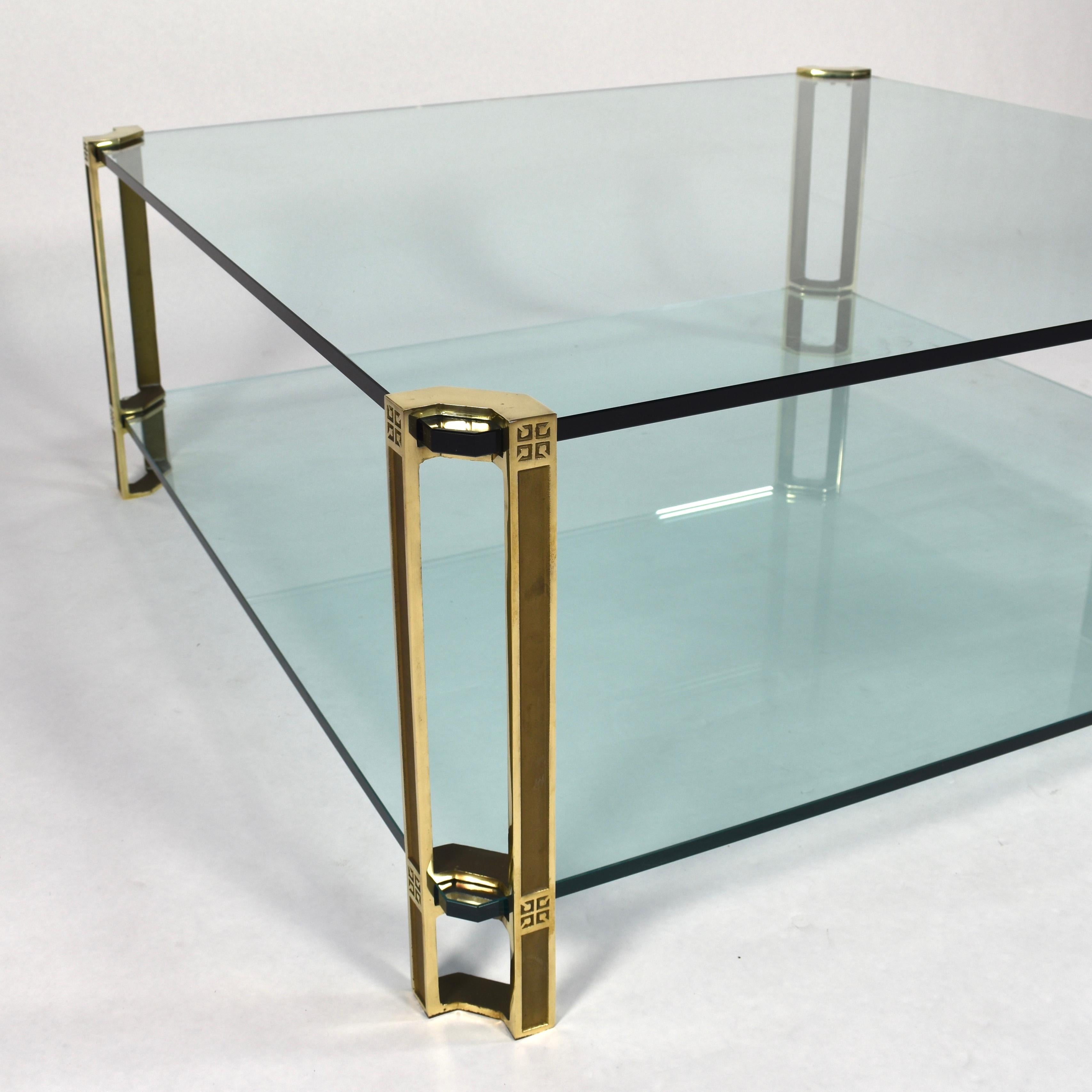 Large Peter Ghyczy coffee table in solid brass and glass. Gorgeous centerpiece for a seating corner or other. Peter Ghyczy was a German designer that started a company in The Netherlands were he designed a lot of famous items among which his glass