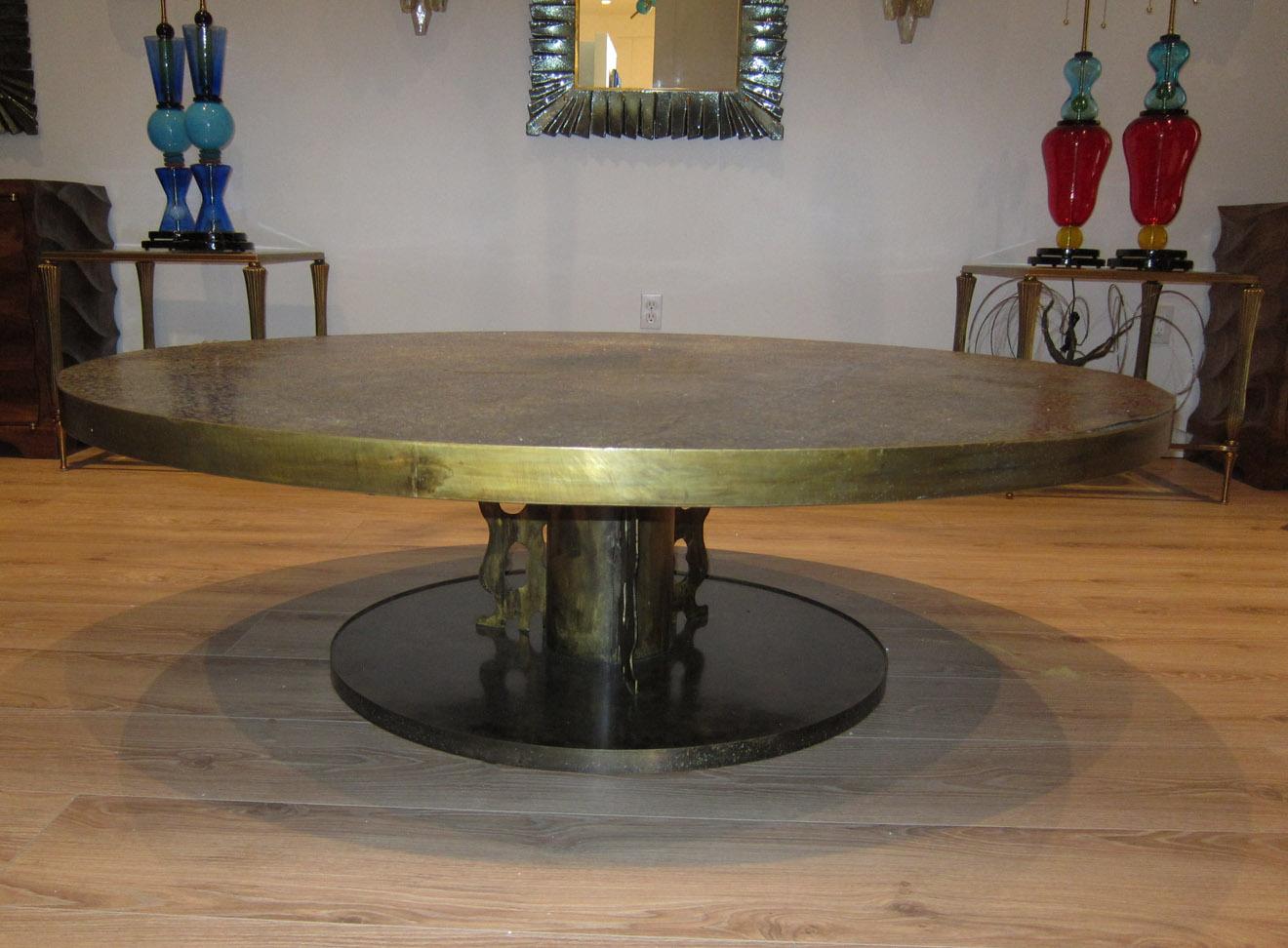 A rare and custom ordered round coffee table, 60 inches / 153 cm diameter with etched, patinated bronze, Etruscan pattern. Etched signature to the base. Beautiful warm patina and excellent vintage condition. By Philip and Kelvin Laverne.

  