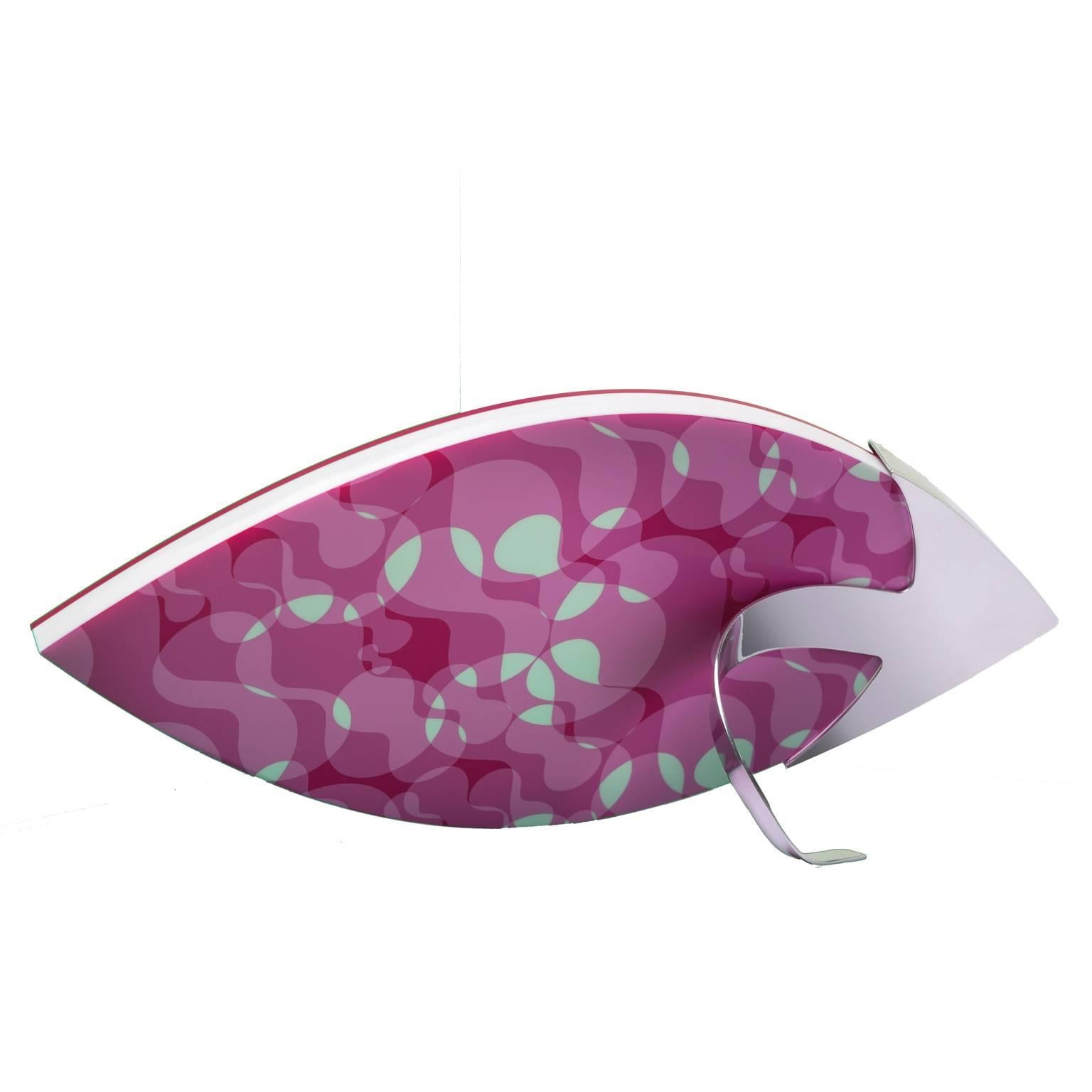 Vision is a large  photo  frame of the precious collection of photo frames 
Art with Heart Laura G.
Handcrafted fuchsia methacrylate and plexiglas with white and fuchsia serigraphy with a steel foot. A designer sculpture, an iconic post modern
