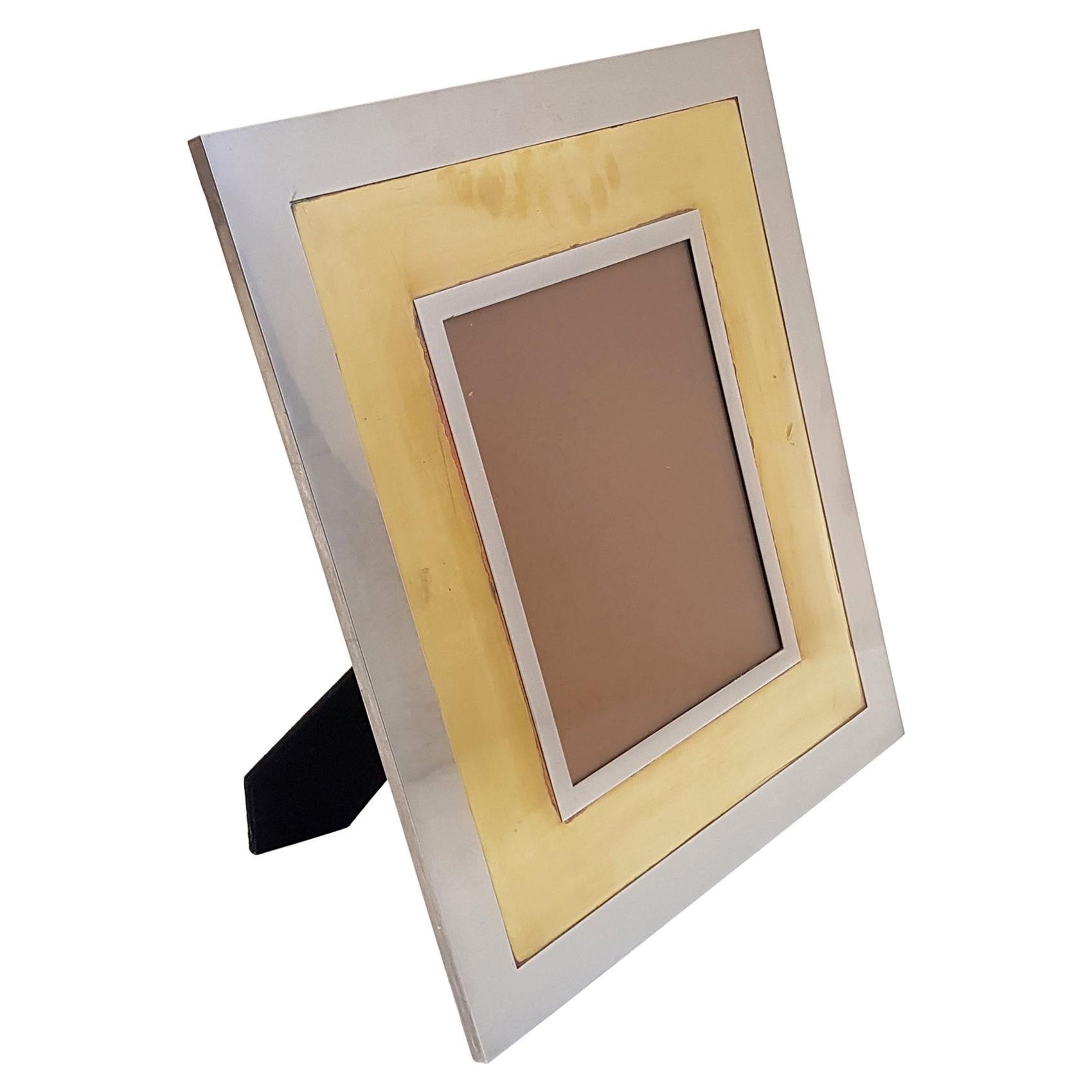 A large Italian photo frame from the 1970s made in brass and steel made to be standing.