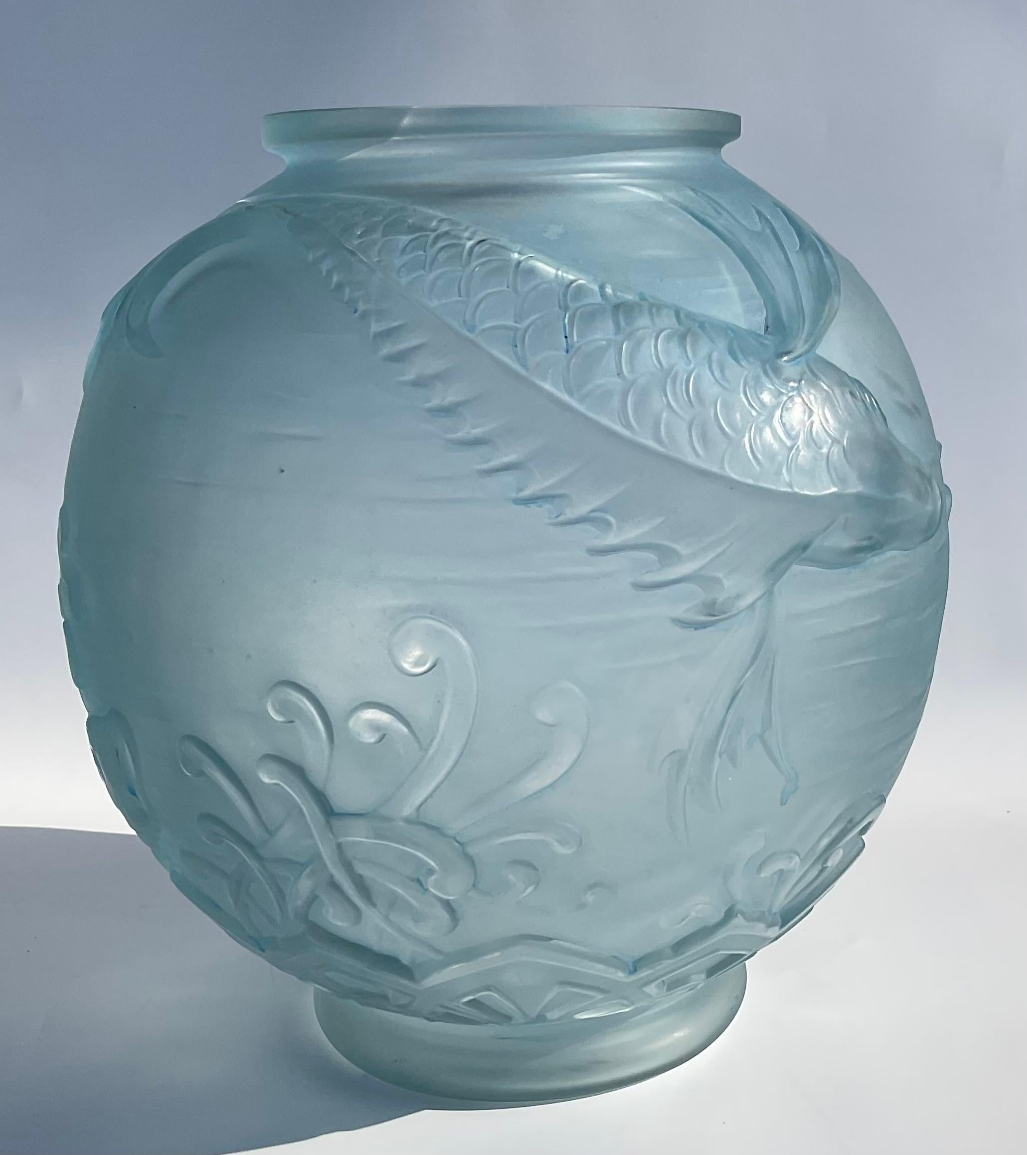 Large Pierre D’Avesn Large French Art Deco Flying fish vase circa 1930s with an amazing blue patina. Very well designed piece.