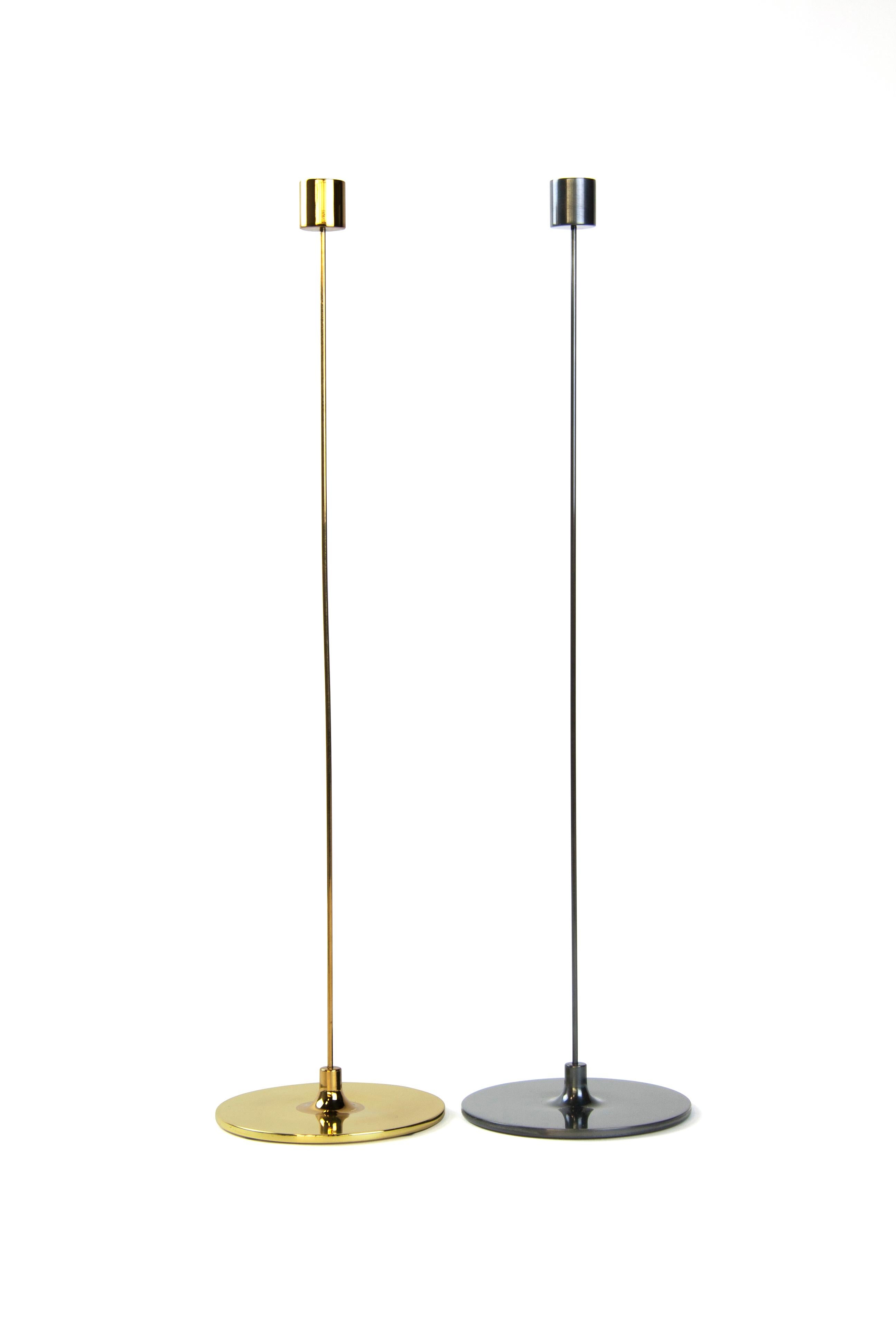 Large pin brass candlestick by Gentner Design
Dimensions: D 12.7 x H 50.8 cm.
Materials: polished tarnished brass.
Available in polished tarnished brass and darkened brass.
Available in small, medium and large.

With an 12”, 16”, or 20”