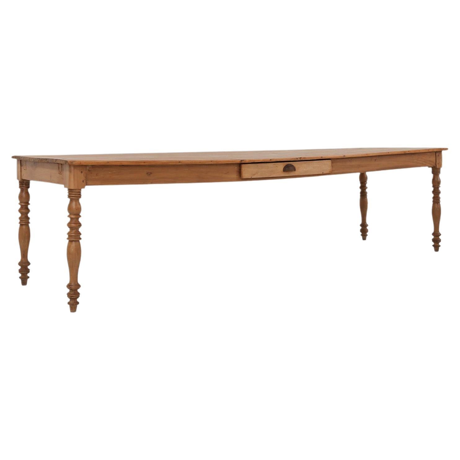 Large pine wood farm table with drawer and turned legs, France, 1850s For Sale