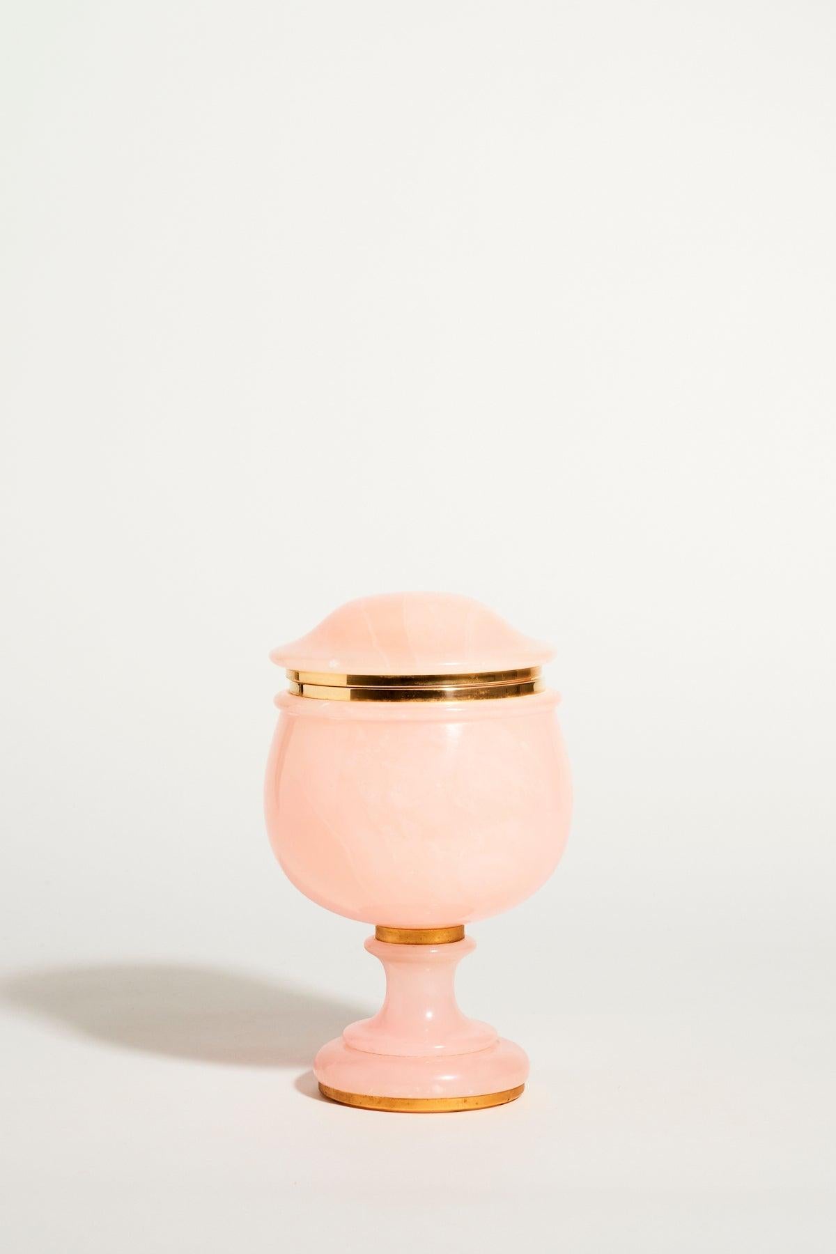 Unusual large pink alabaster jewelry bowl with hinged lid and pedestal stand.