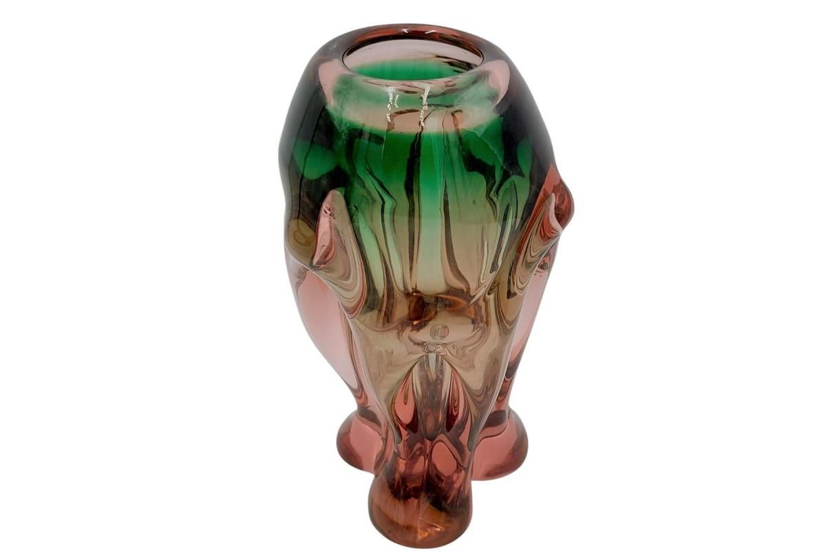 Unique large vase made of heavy art glass in pink and green color

Vase produced in the Czech Republic in the 1960s.

Very good condition, no cracks

height 29cm, diameter 15cm.