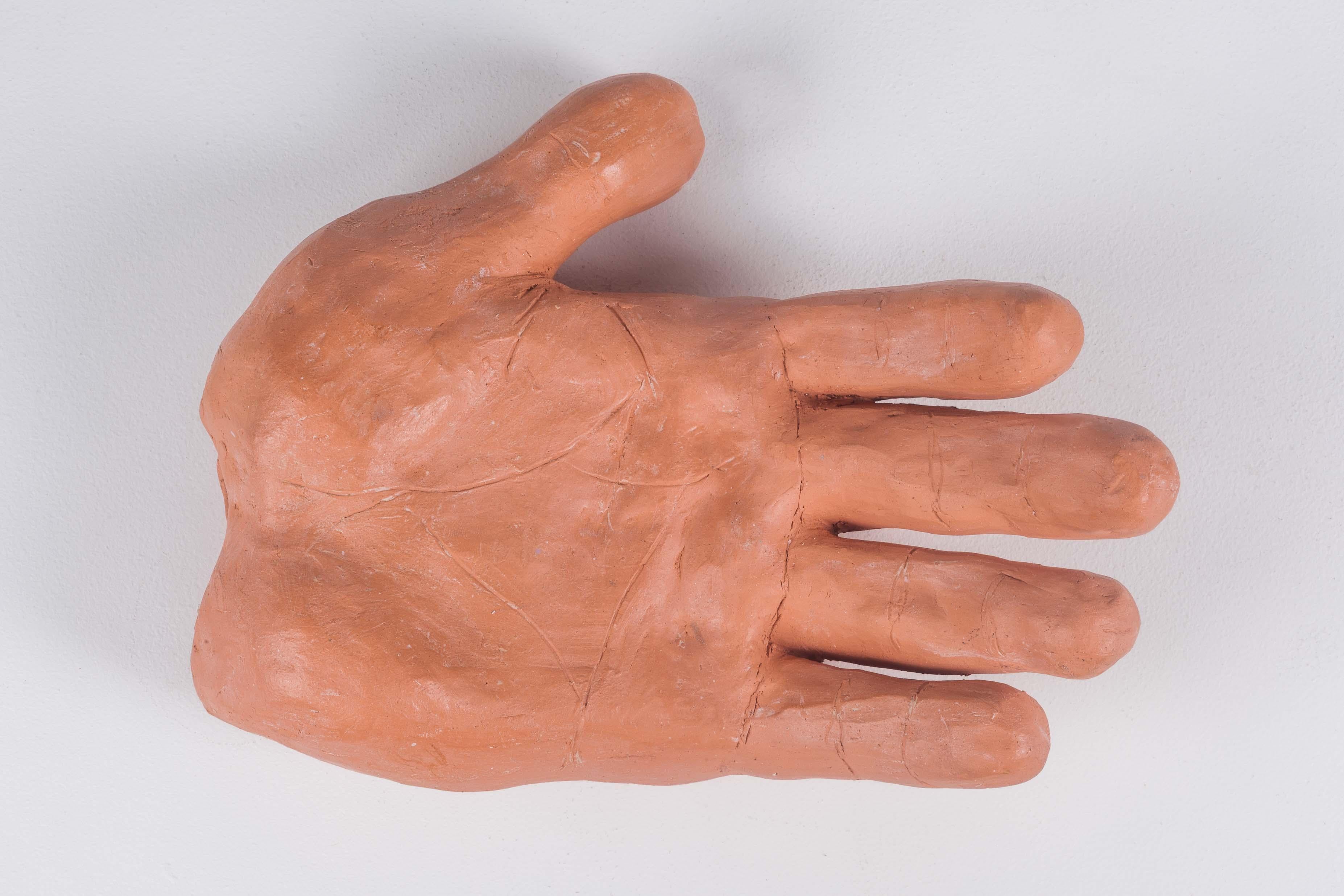 Handmade large pink hand sculpture/catchall by unknown American artist. Oversized, goofy and in your face. The soft touch of clay adds some life to that hand straight out of a comic book. A decorative American studio pottery piece, and a functional