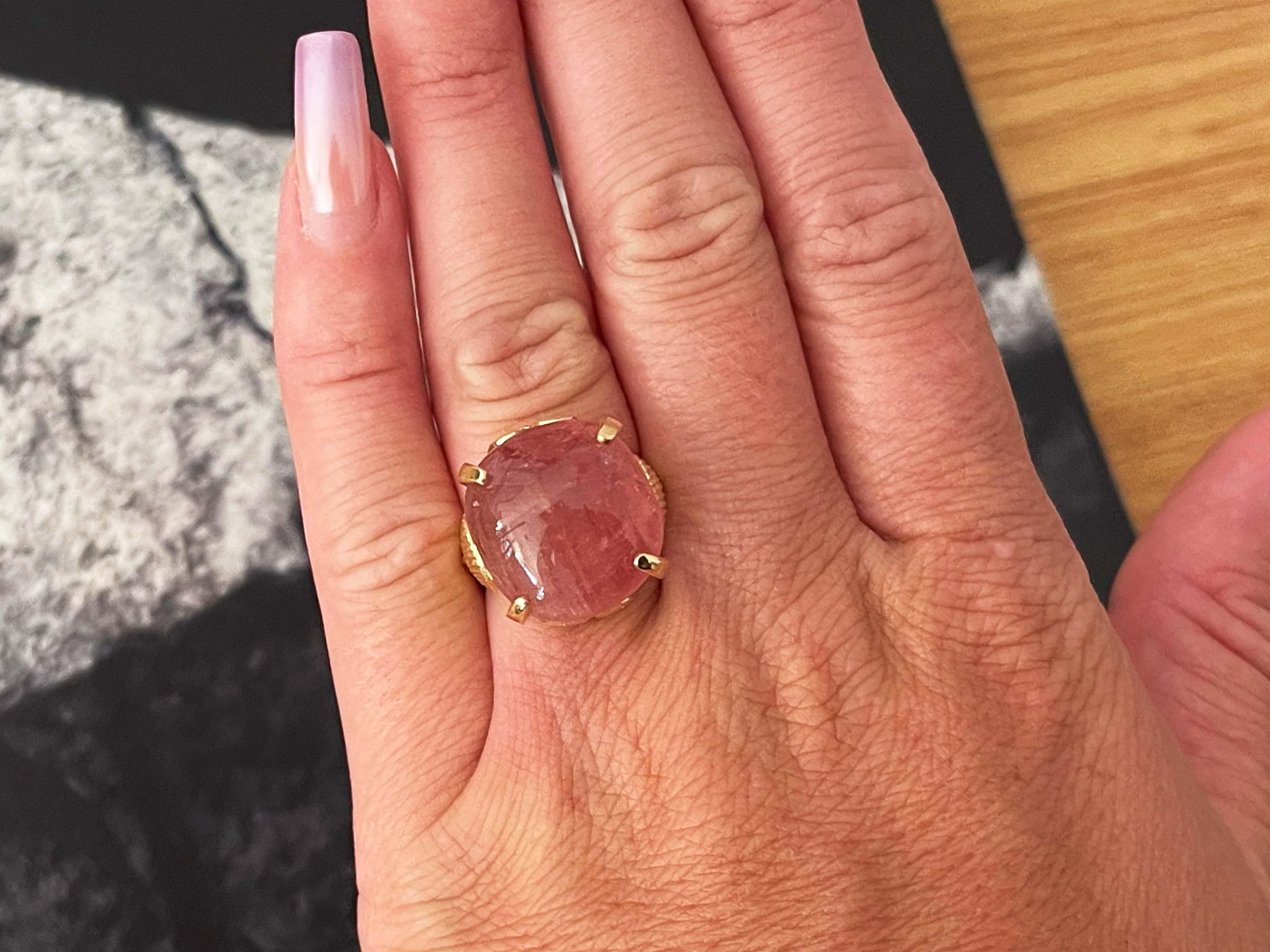 Item Specifications:

Metal: 14K Yellow Gold

Ring Size: 6

Total Weight: 14.2 Grams

Gemstone Specifications:

Gemstones: 1 pink tourmaline

Tourmaline Measurements: ~17.6 mm x 16.3 mm x 11 mm

Tourmaline Carat Weight: ~26 carats

Condition: