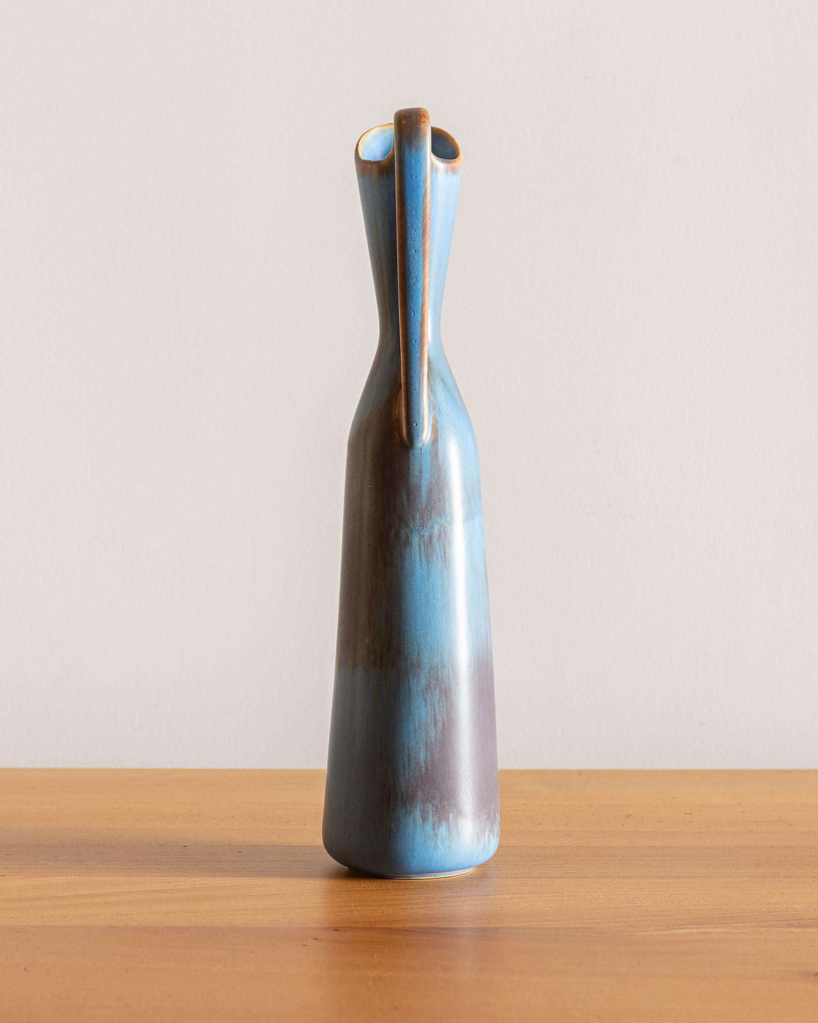 A large pitcher by Gunnar Nylund for Rorstrand in blue and brown glaze, Sweden, 1960s.