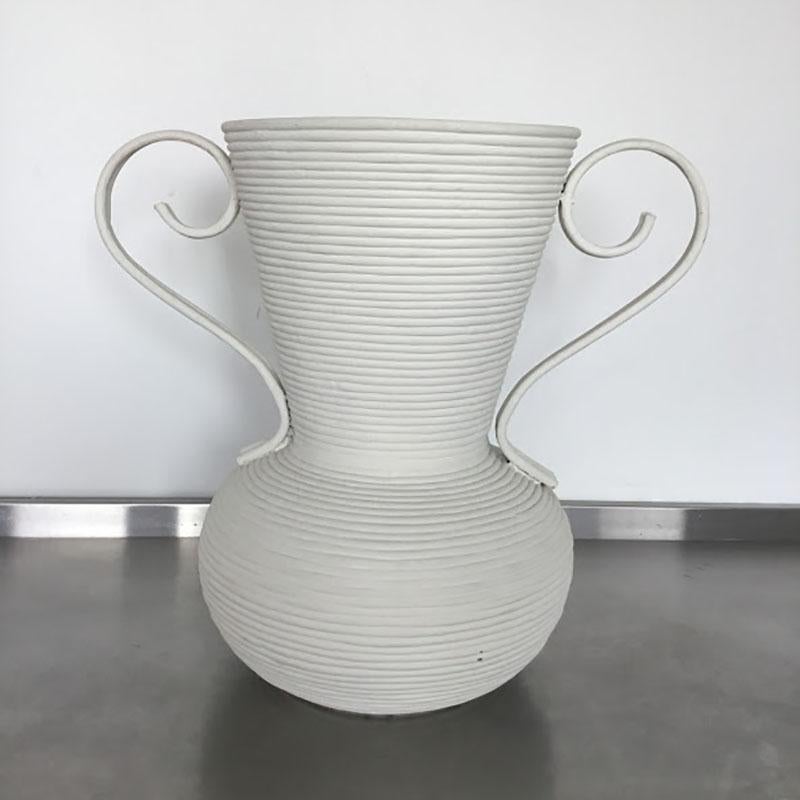 Large decorative vase
Plaster covered finish
Made from coiled rattan.