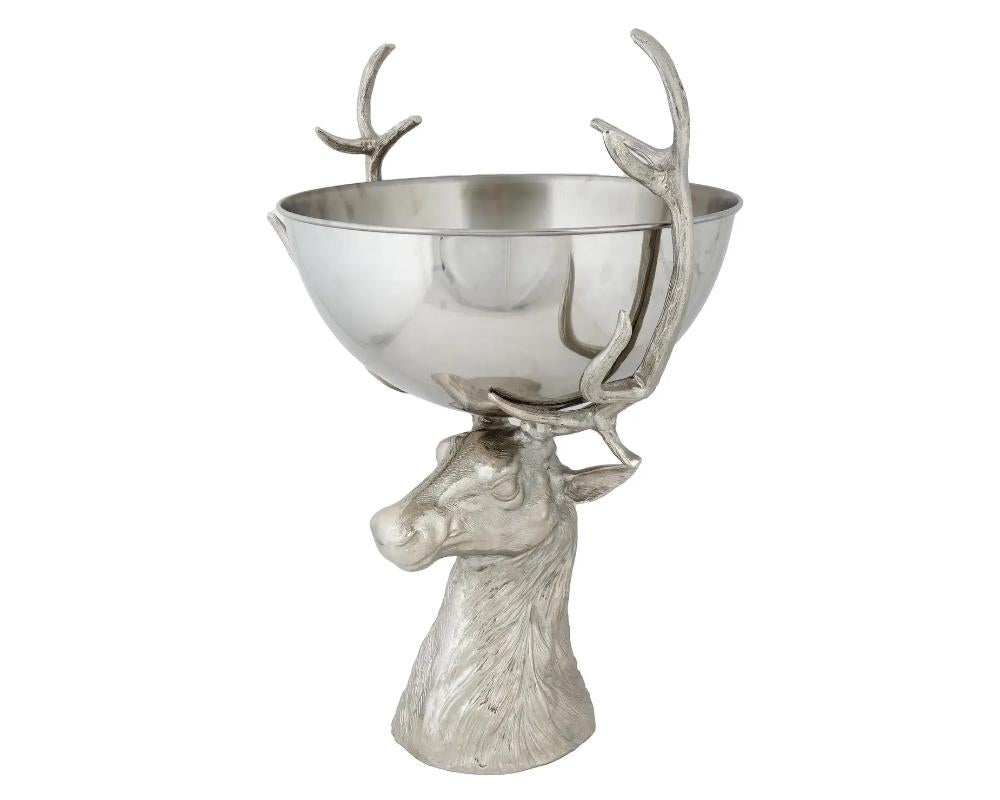 A large Contemporary plated cast metal serving bowl with a sculptural stand can be used as a champagne bowl or an ice bucket. The stand is made in a shape of a head of a deer, engraved with detailed patterns. Unmarked. Modern and Contemporary