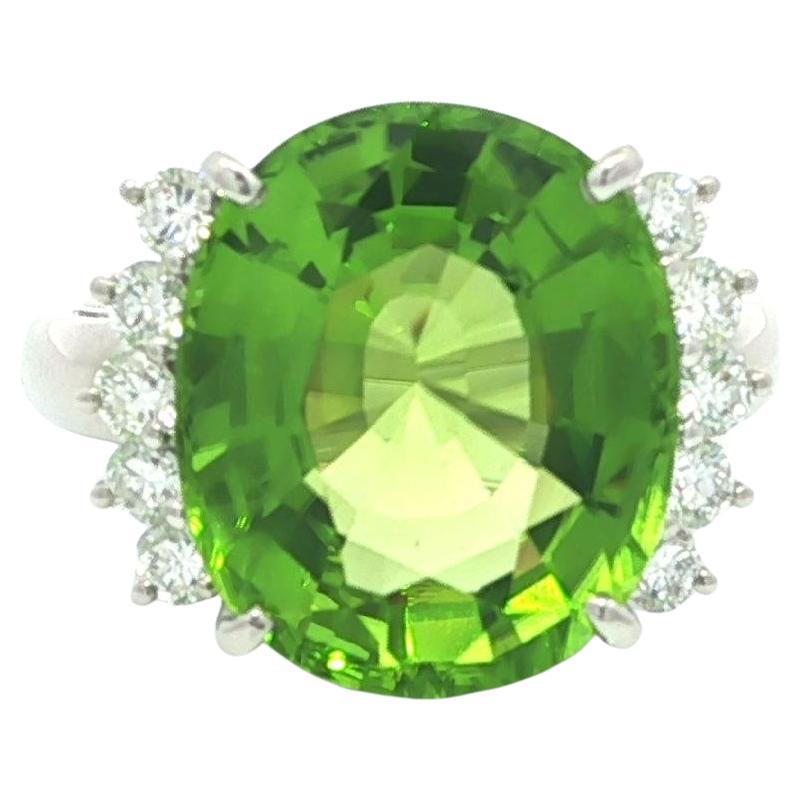 Large Platinum 8.46ctw Oval Bright Green Oval Peridot w/ Diamond Accents Ring