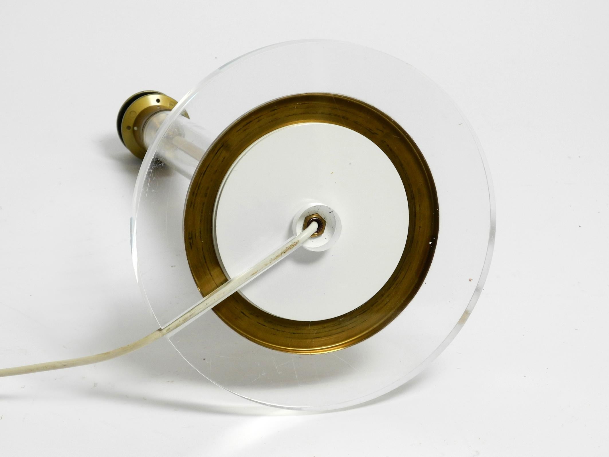 Large plexiglass and brass table lamp from the 1970s by Vereinigte Werkstätten For Sale 4