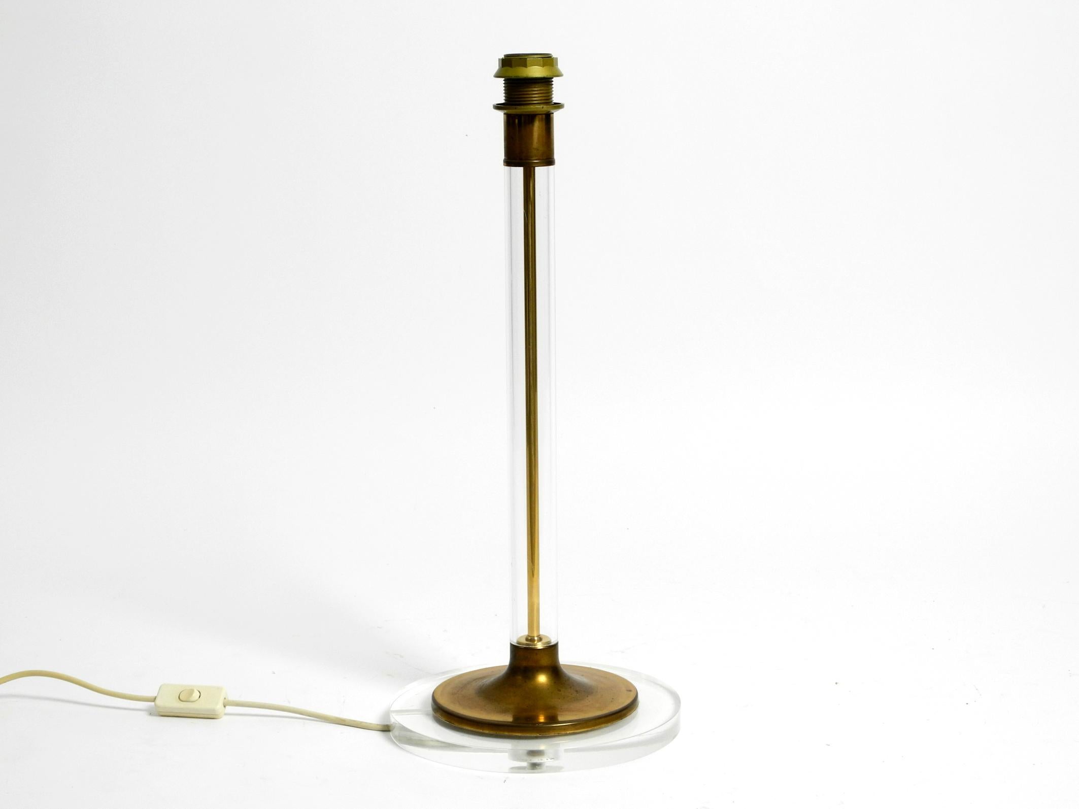 Brass Large plexiglass and brass table lamp from the 1970s by Vereinigte Werkstätten For Sale