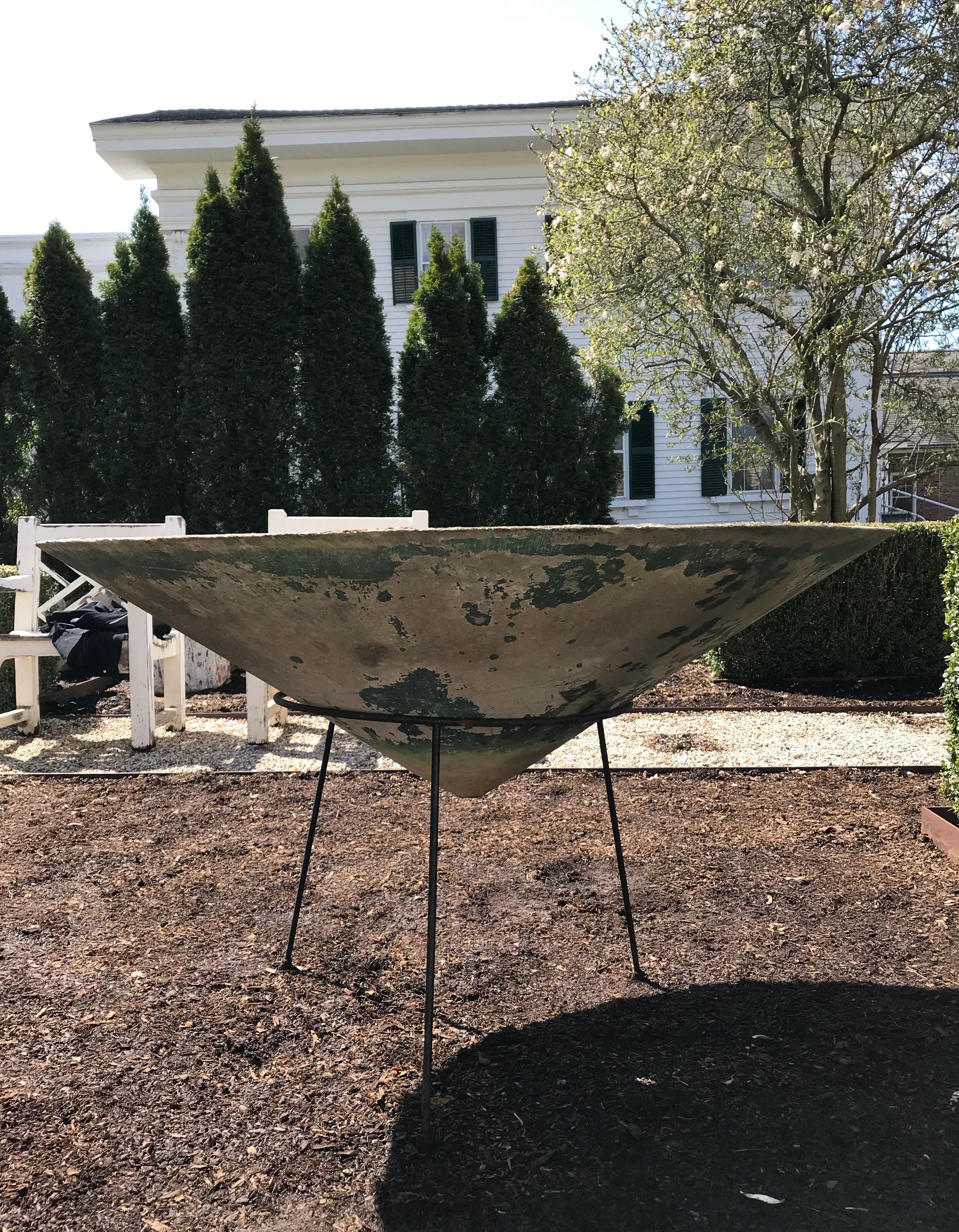 This very large planter, designed by the iconic Willy Guhl and made by Eternit of Switzerland, is a very rare piece indeed. With its wide-sloping conical form, it is best displayed in a three-legged steel Stand that we have had custom made for it.
