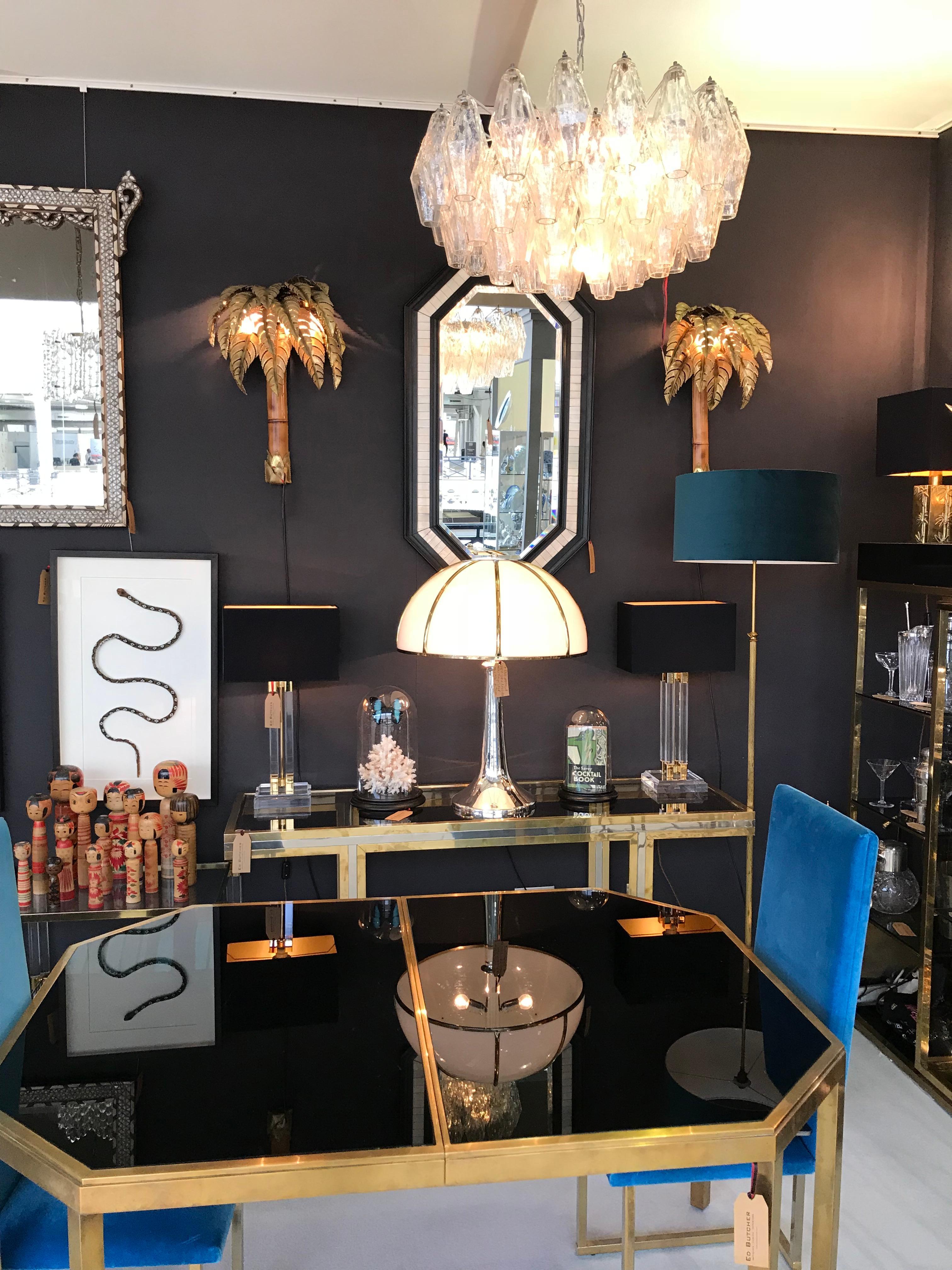 A large poliedri chandelier by Carlo Scarpa for Venini, with 65 large, 18cm high, clear glass Poliedri drops suspended from chromed metal frame with seven-light fittings. Re wired with new fittings and PAT tested. The frame has been re-sprayed in