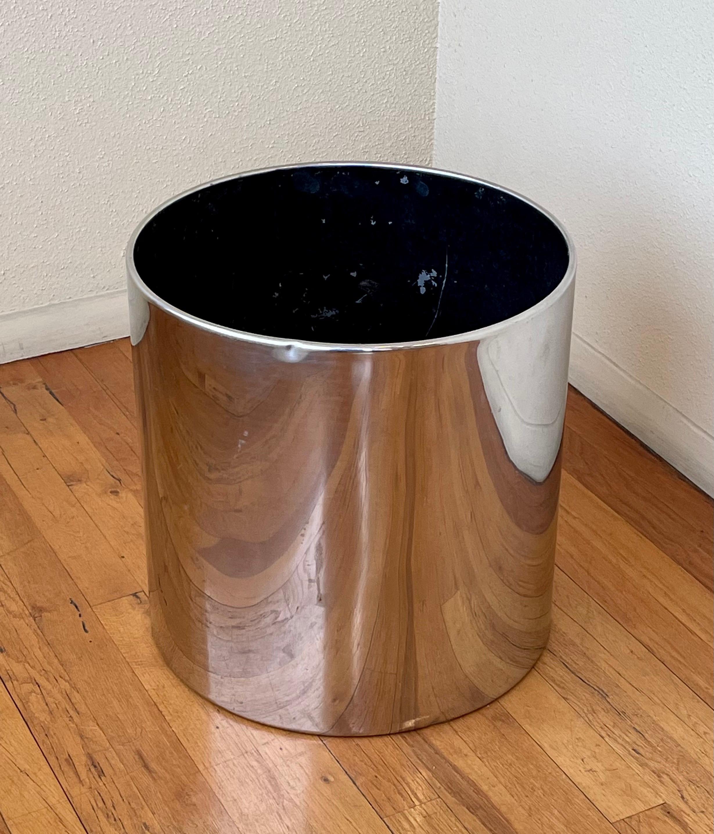 Large polished aluminum with black enameled interior a curved lip edge, shows small ding on top, very nice and clean condition considering it is over 40 years old.