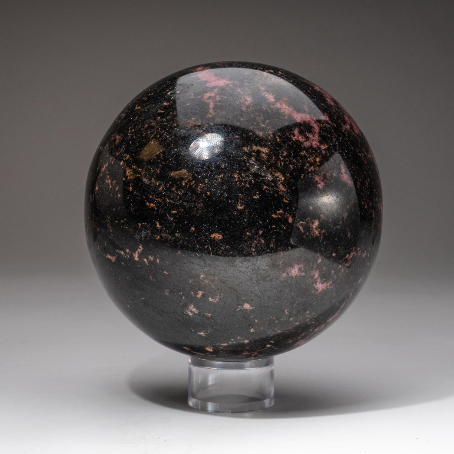 Contemporary Large Polished Imperial Rhodonite Sphere from Madagascar (5.25'', 11.4 lbs) For Sale
