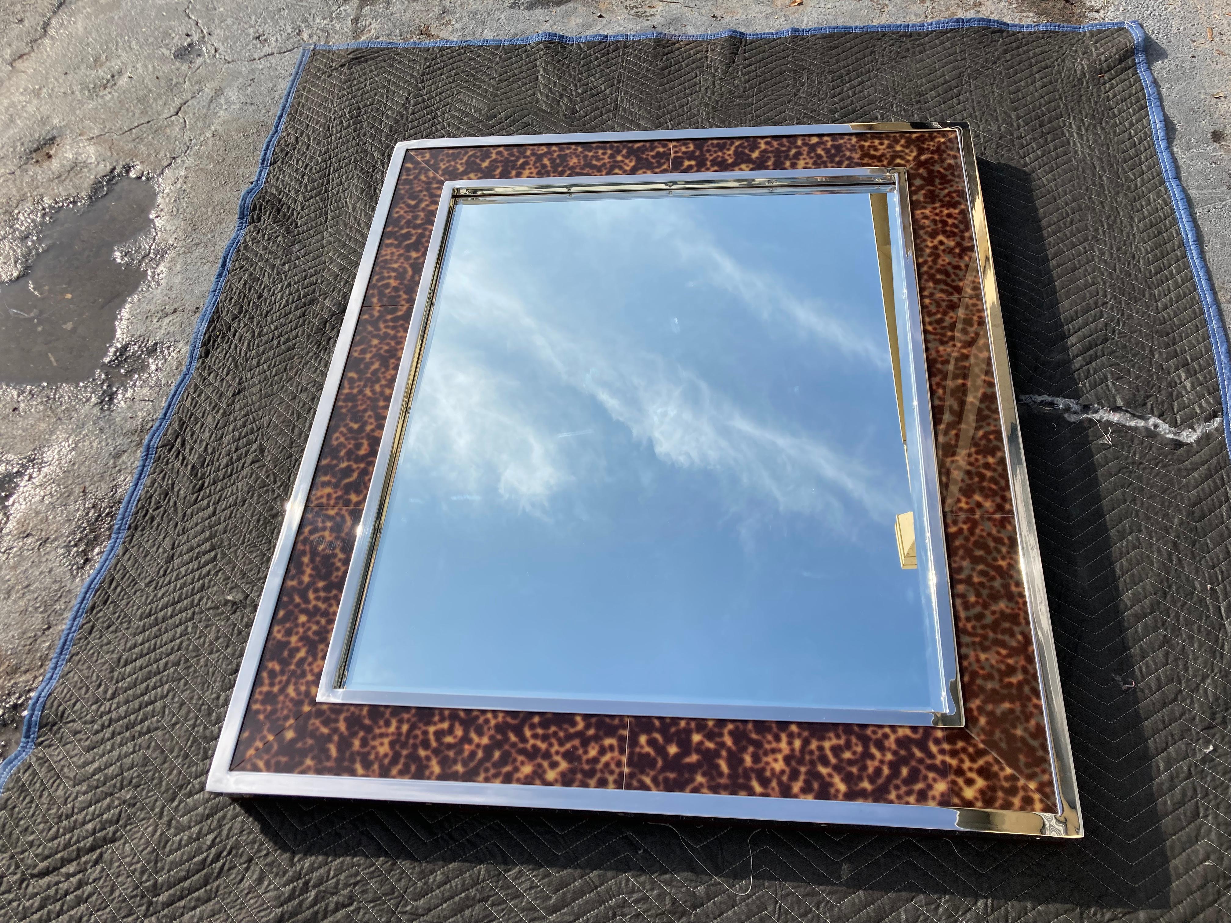 Large Polo Ralph Lauren mirror. Mahogany colored wood sides, Stainless Steel frame and Tortoise Shell Design. Exceptional Piece.