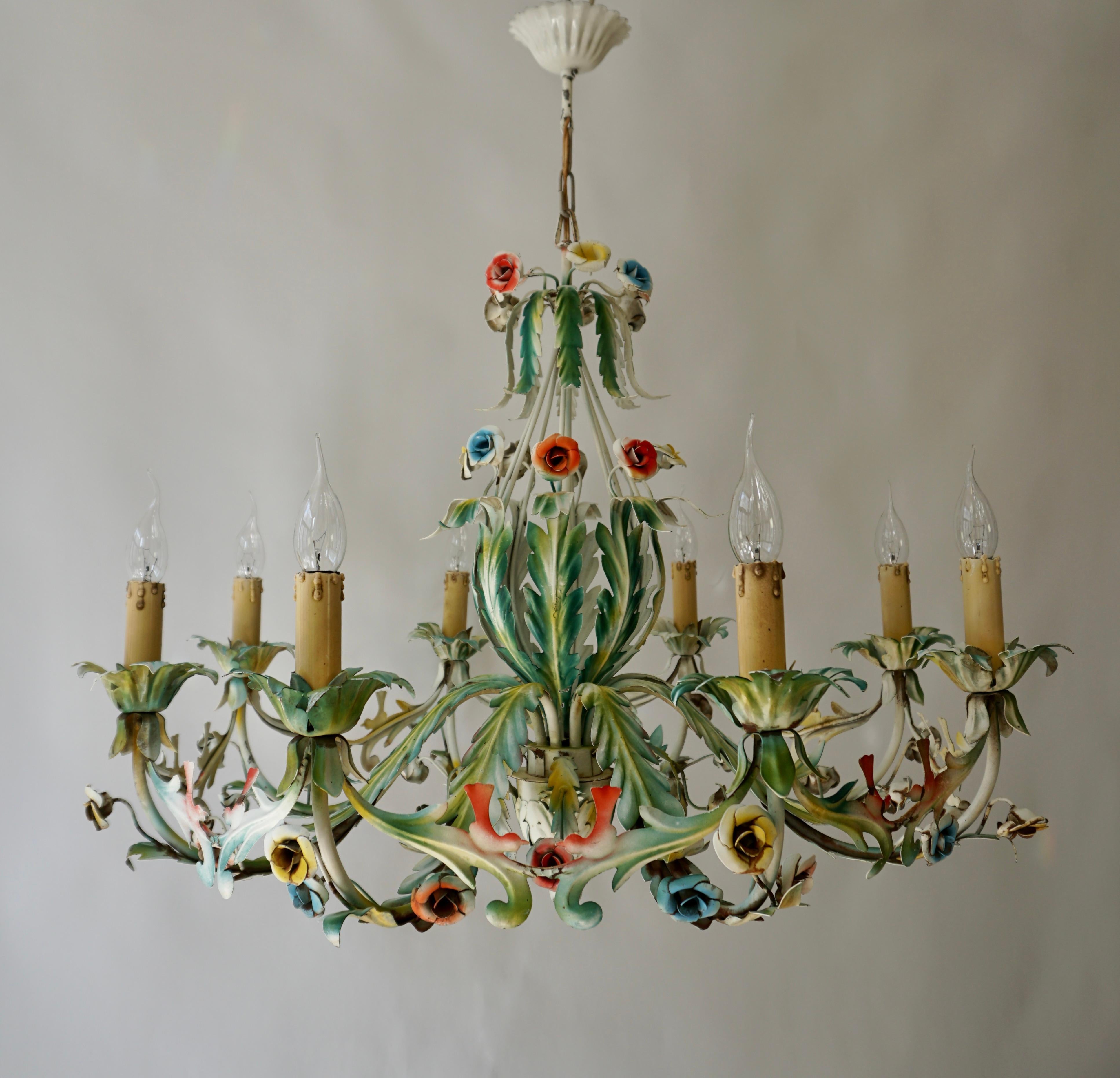 Large Polychrome painted metal eight-light chandelier decorated with flowers and birds, Italy, circa the 1970s. 

A beautiful Italian ceiling light made of metal with flowers and leaves painted in pastel pink, blue, green, and yellow colors. Eight