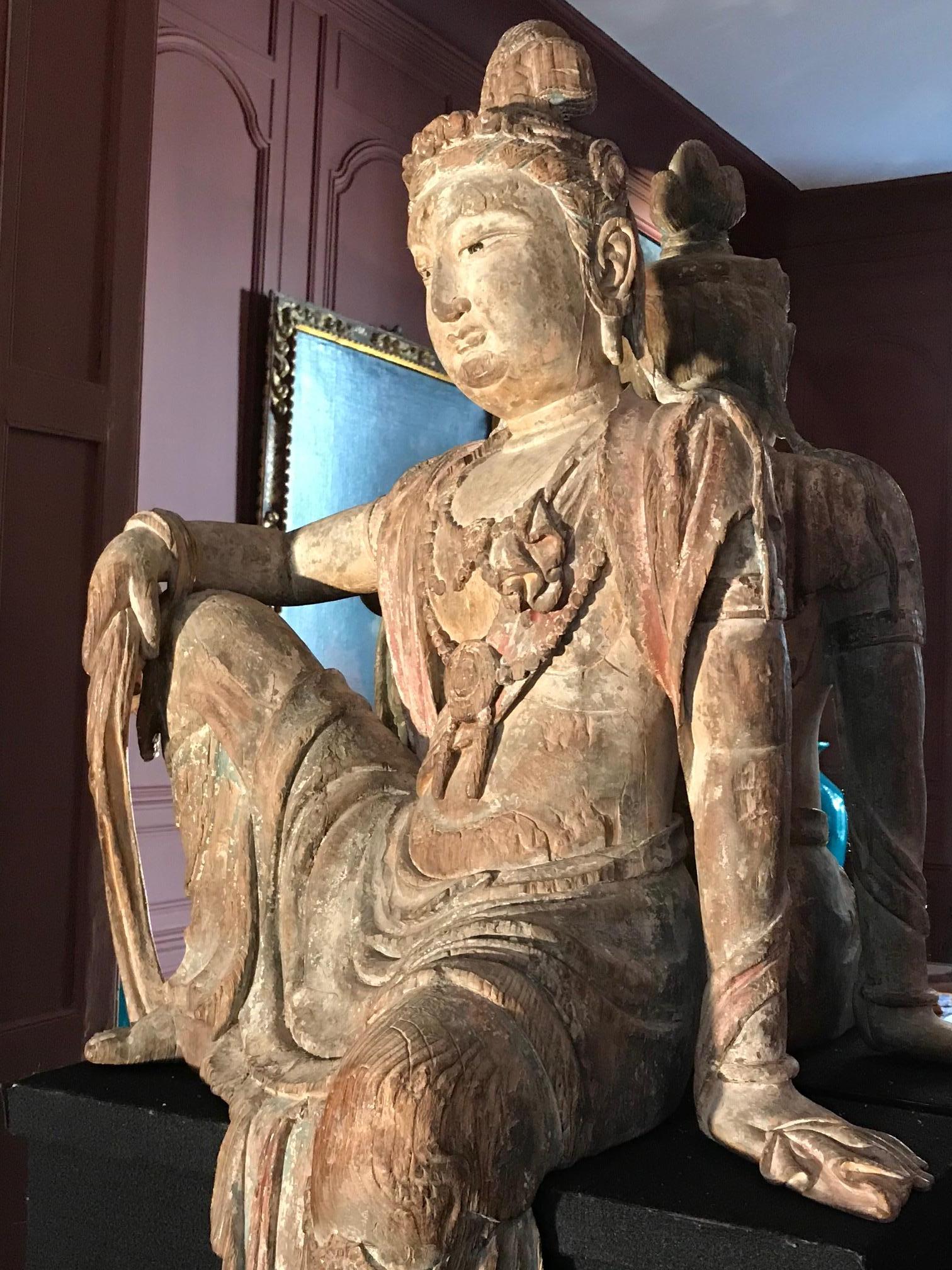 A large polychrome wood figure of Guanyin, China, Qing dynasty, 19th century, from a private collection, directly bought in China in 1980 by the former owner for his Parisian apartment. 
His collection was supervised by the famous Daniel Pasgrimaud,