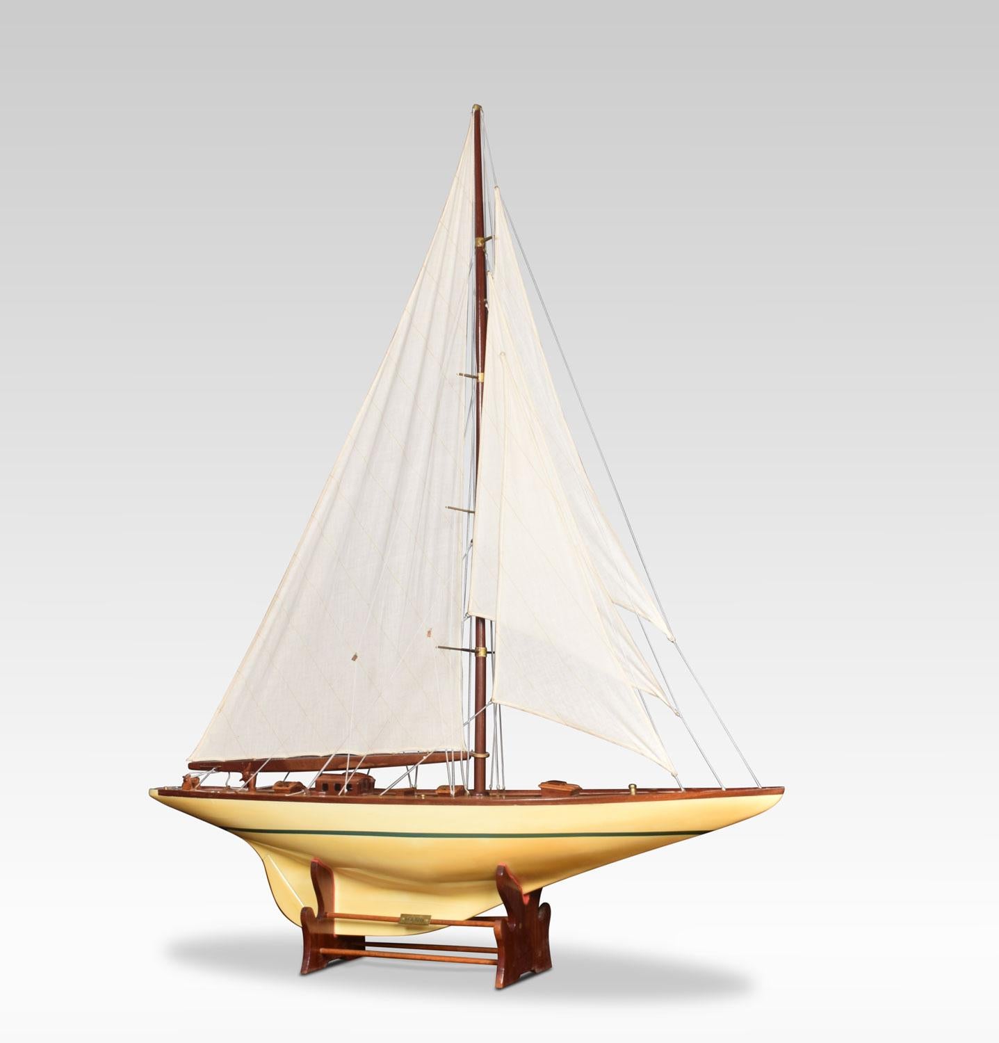 Large pond yacht, painted in yellow and green complete with four sails and simulated planked decking. The yacht named Shamrock.
Dimensions
Height 61 Inches
Width 47 Inches
Depth 10 Inches