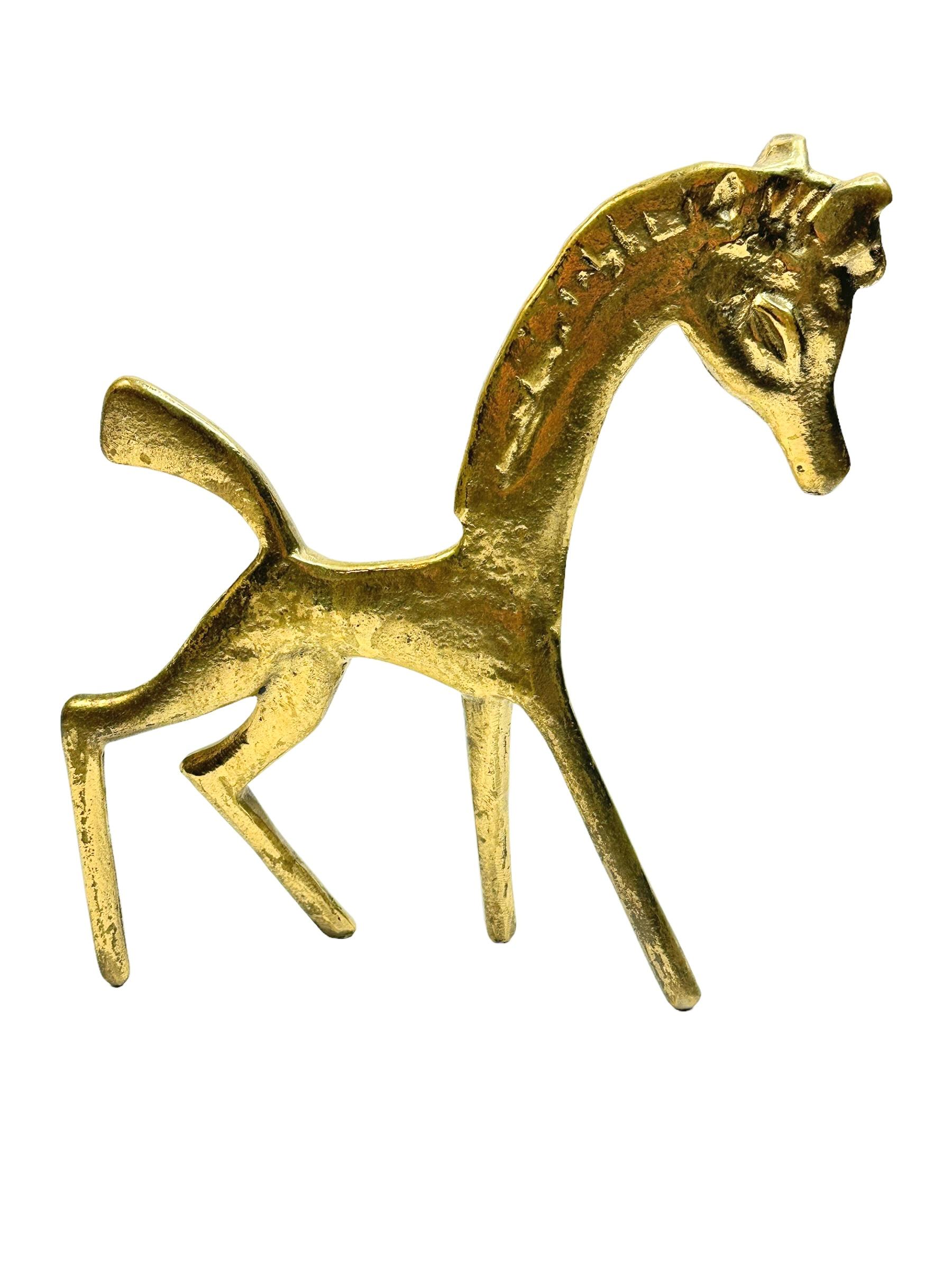 Classic early 1960s Austrian figurine, designed by Walter Bosse. Nice addition to your room, on your desk top or just for your collection of Austrian midcentury items. Charming, big and solid this horse figurine is made of brass. A very humorous