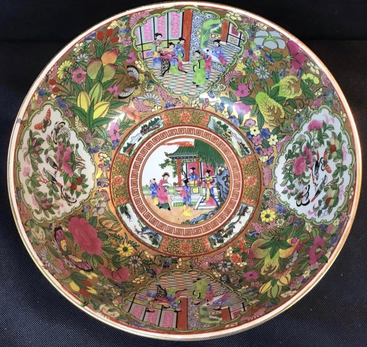 Traditional Chinese Rose Medallion large bowl with social scenes and nature motifs of butterflies, florals, and birds. A very nice larger size bowl! All hand painted with enamel and gilt accents. Stamped character mark on the bottom.