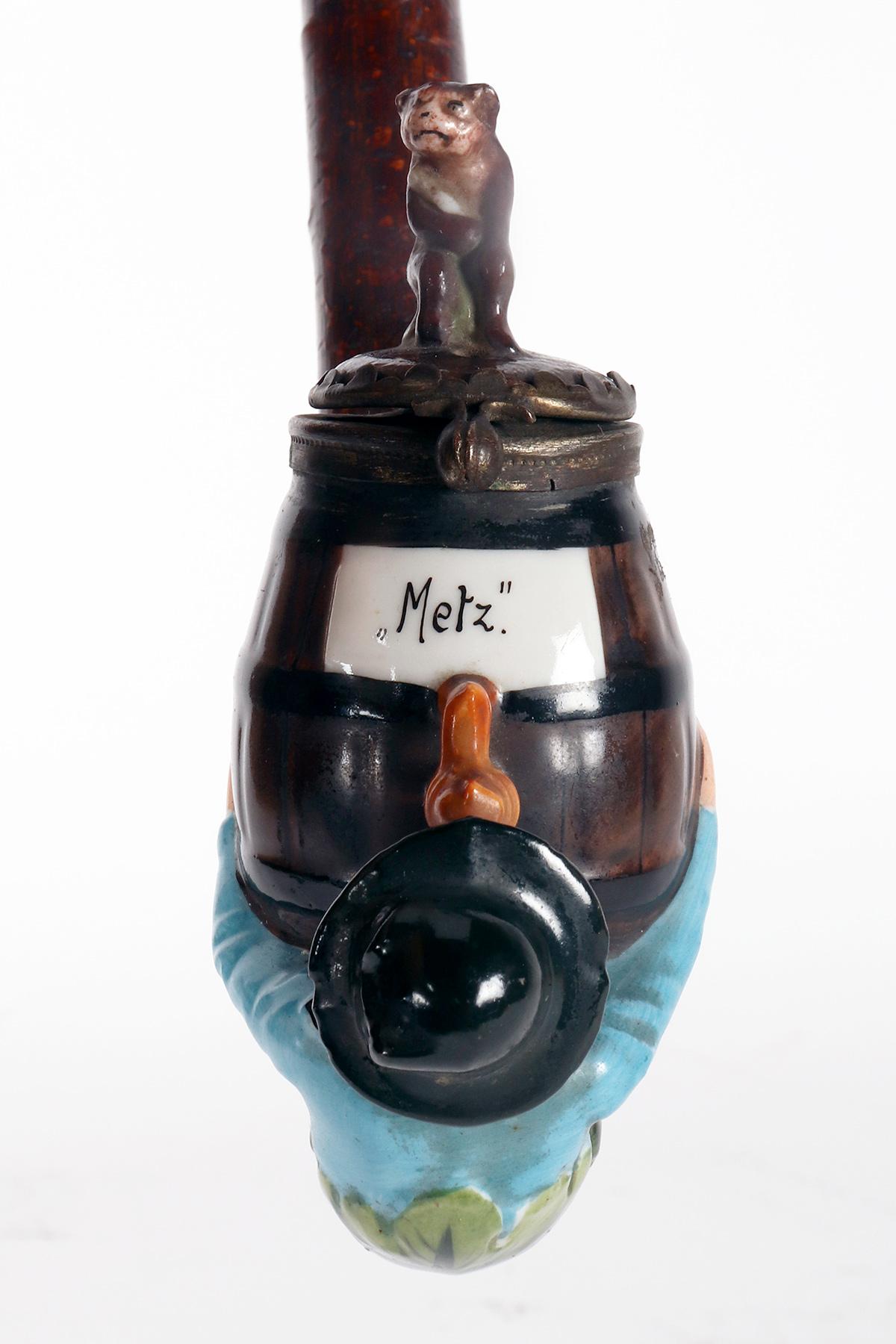 19th Century Large porcelain pipe: a reclining man drinking wine, Germany 1880. For Sale