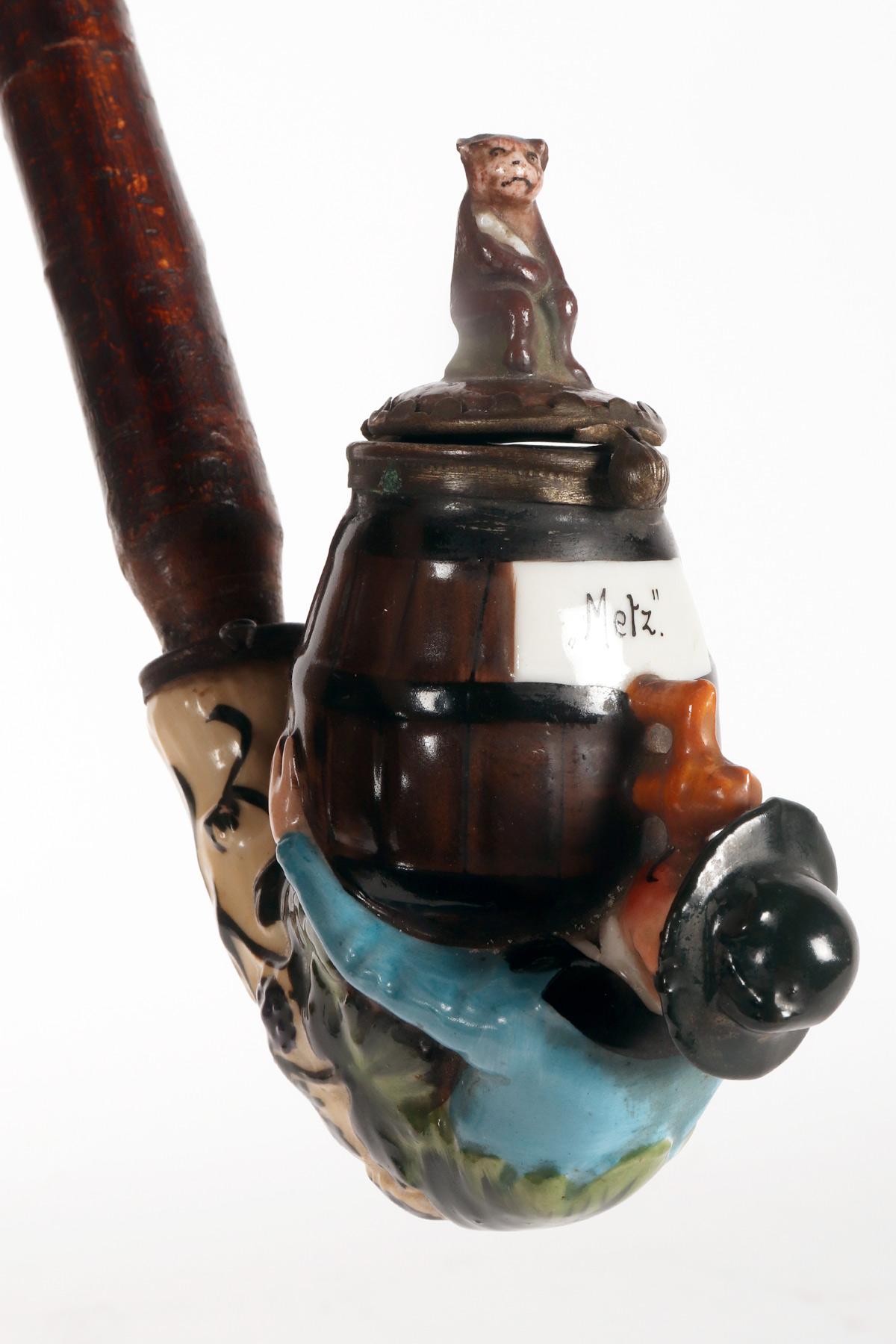 Porcelain Large porcelain pipe: a reclining man drinking wine, Germany 1880. For Sale