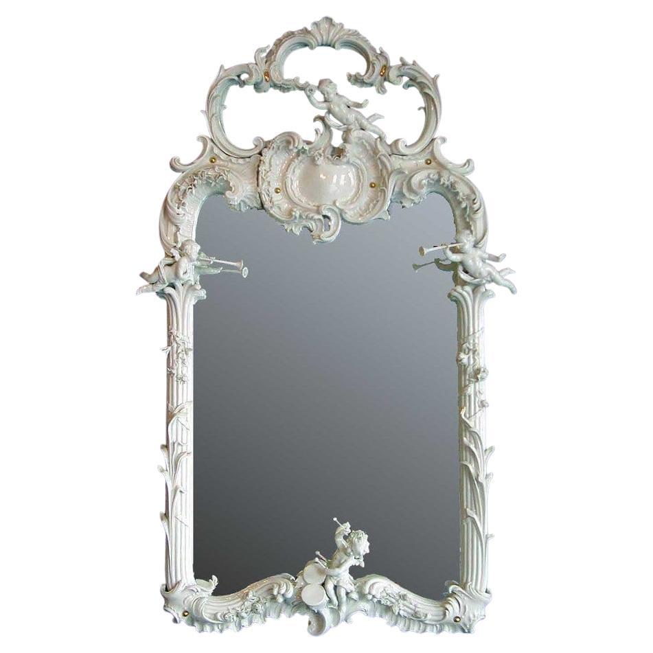 Large Porcelain Wall Mirror with cherubs with musical instruments For Sale
