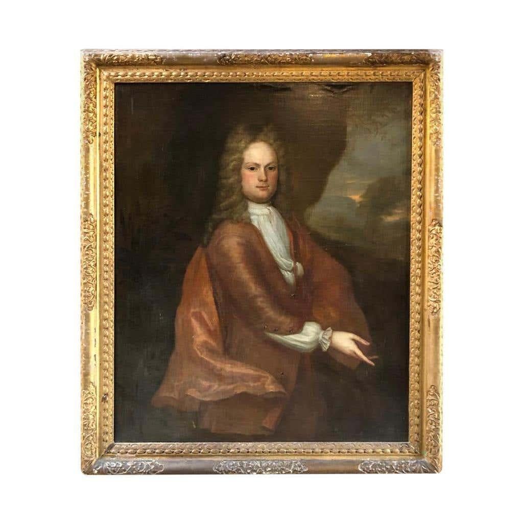 A large beautifully hand painted oil painting of an English gentleman, possibly a lord or duke. Set in the country side with trees and foliage, typical English landscape. Surrounded in a calved wooden gilt frame, and soft pastel colors.