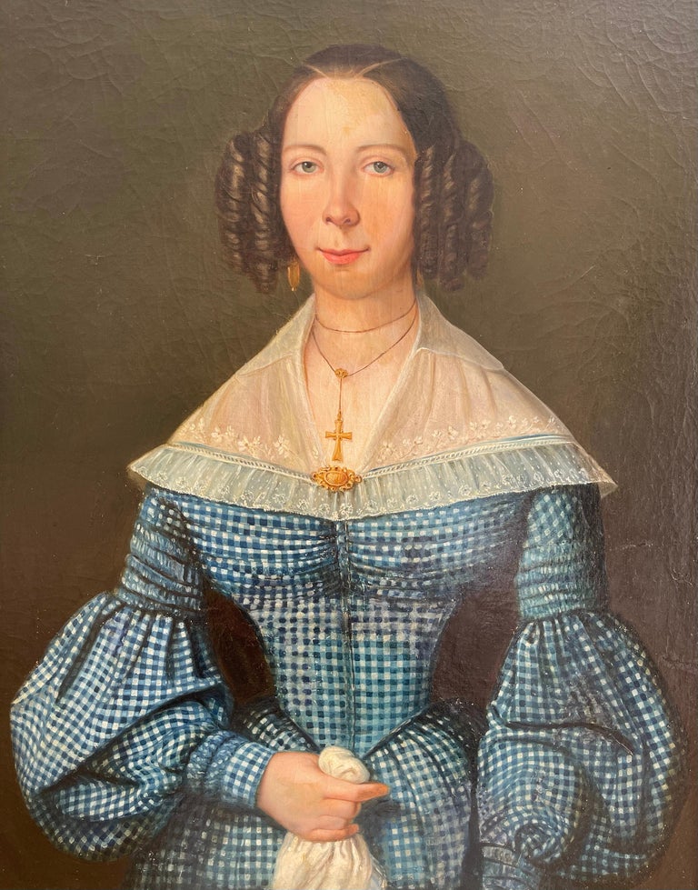 Large portrait of a young lady painted on canvas with a pretty golden frame. Beautiful colors and very good condition.
Dimensions
With frame - W 74 cm x H 90 cm.
Without frame - W 65 cm x H 81 cm.