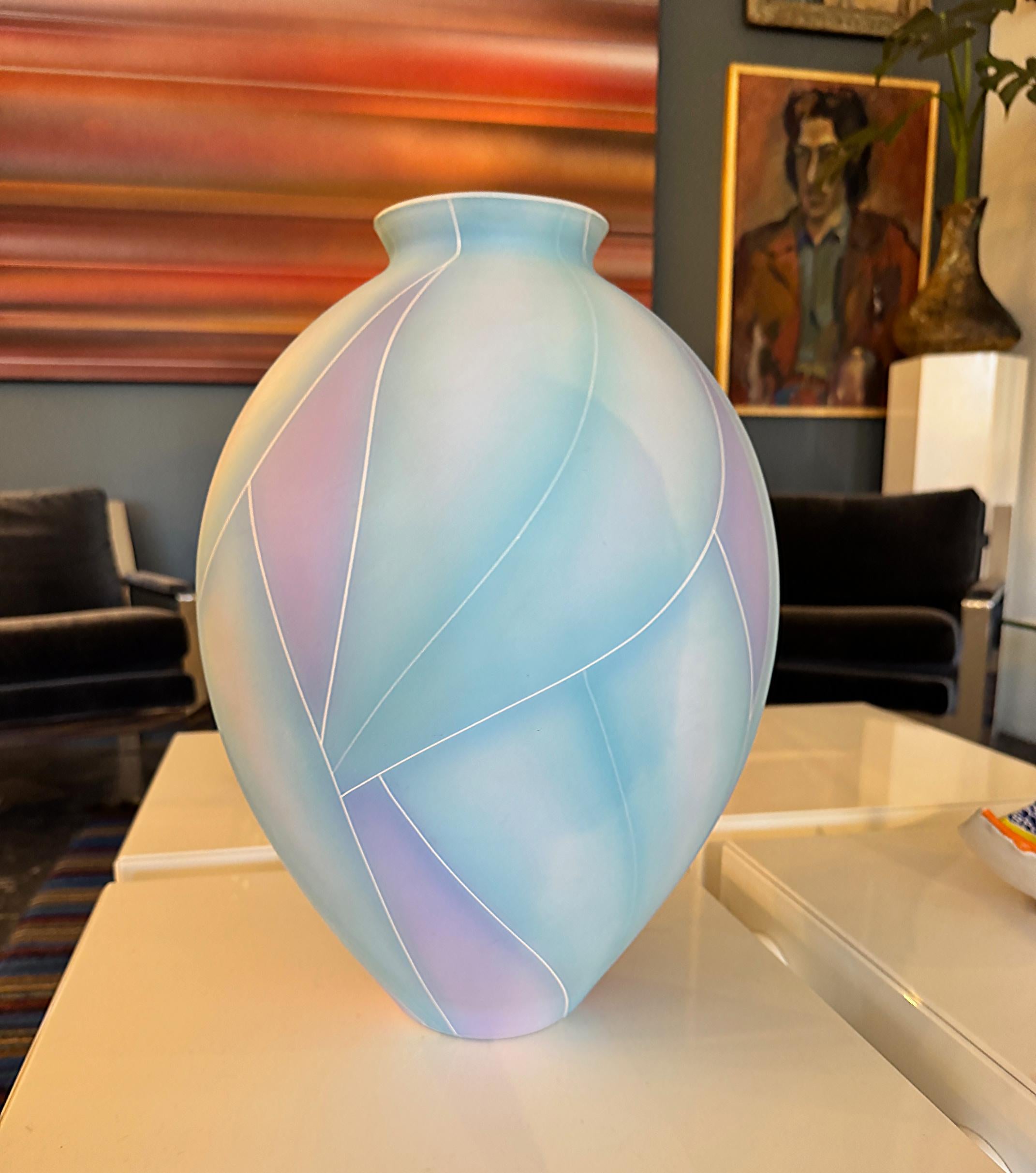 Large Post-Modern Abstract Glazed Studio Pottery Urn, Vase

Offered for sale is a large post-modern studio pottery urn or vase finished in a matte glaze in faint and graded colors of pale green, white and fuchsia or purple. The vase is in very good