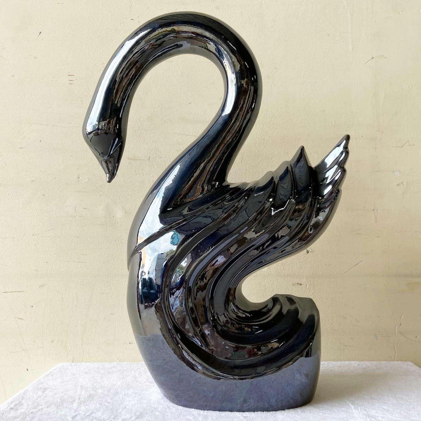 Amazing vintage postmodern ceramic swan. Features a glossy charcoal finish.
