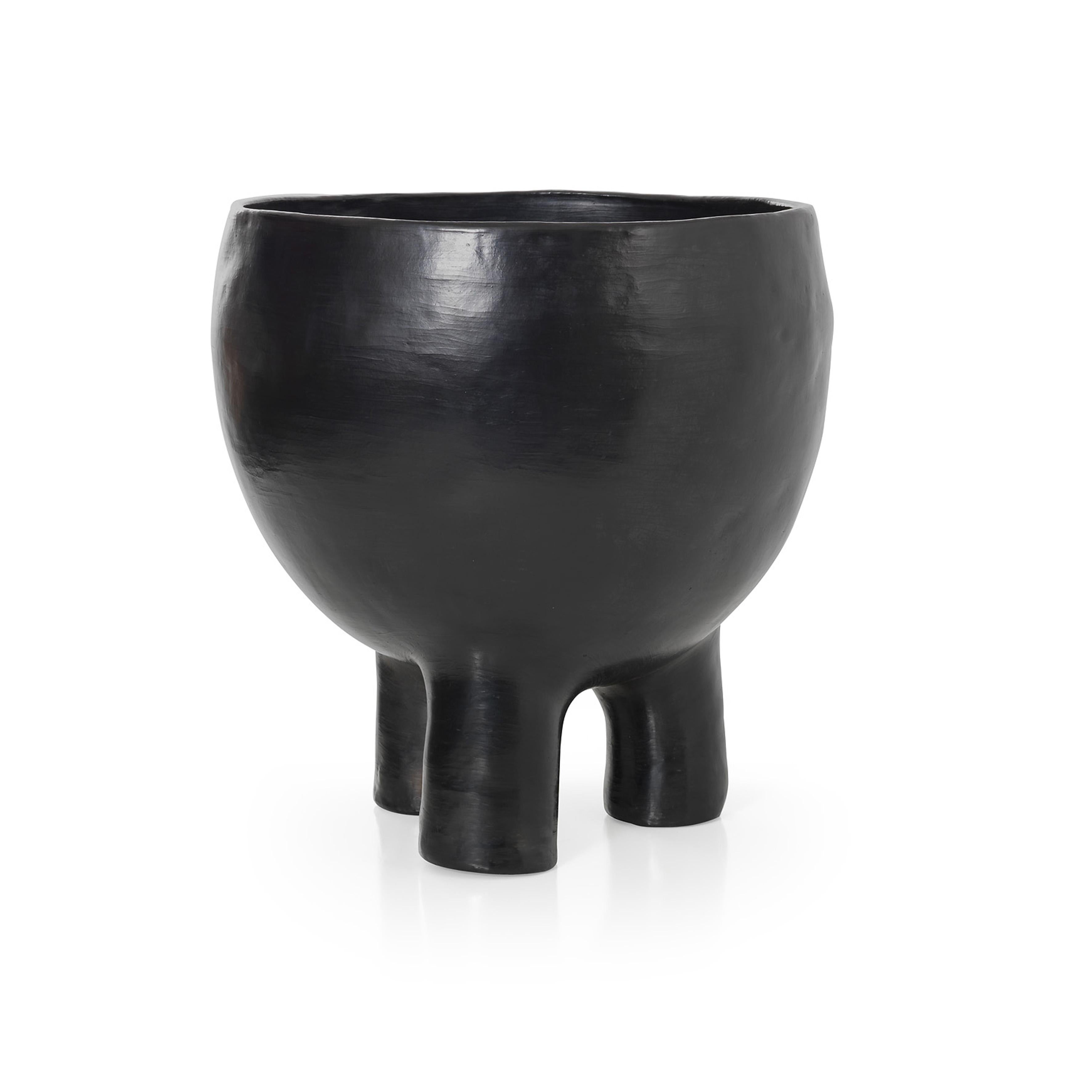 Large Pot 2 by Sebastian Herkner
Materials: Heat-resistant black ceramic. 
Technique: Glazed. Oven cooked and polished with semi-precious stones. 
Dimensions: Diameter 43 cm x H 45 cm 
Available in sizes Small and Mini.

This pot belongs to