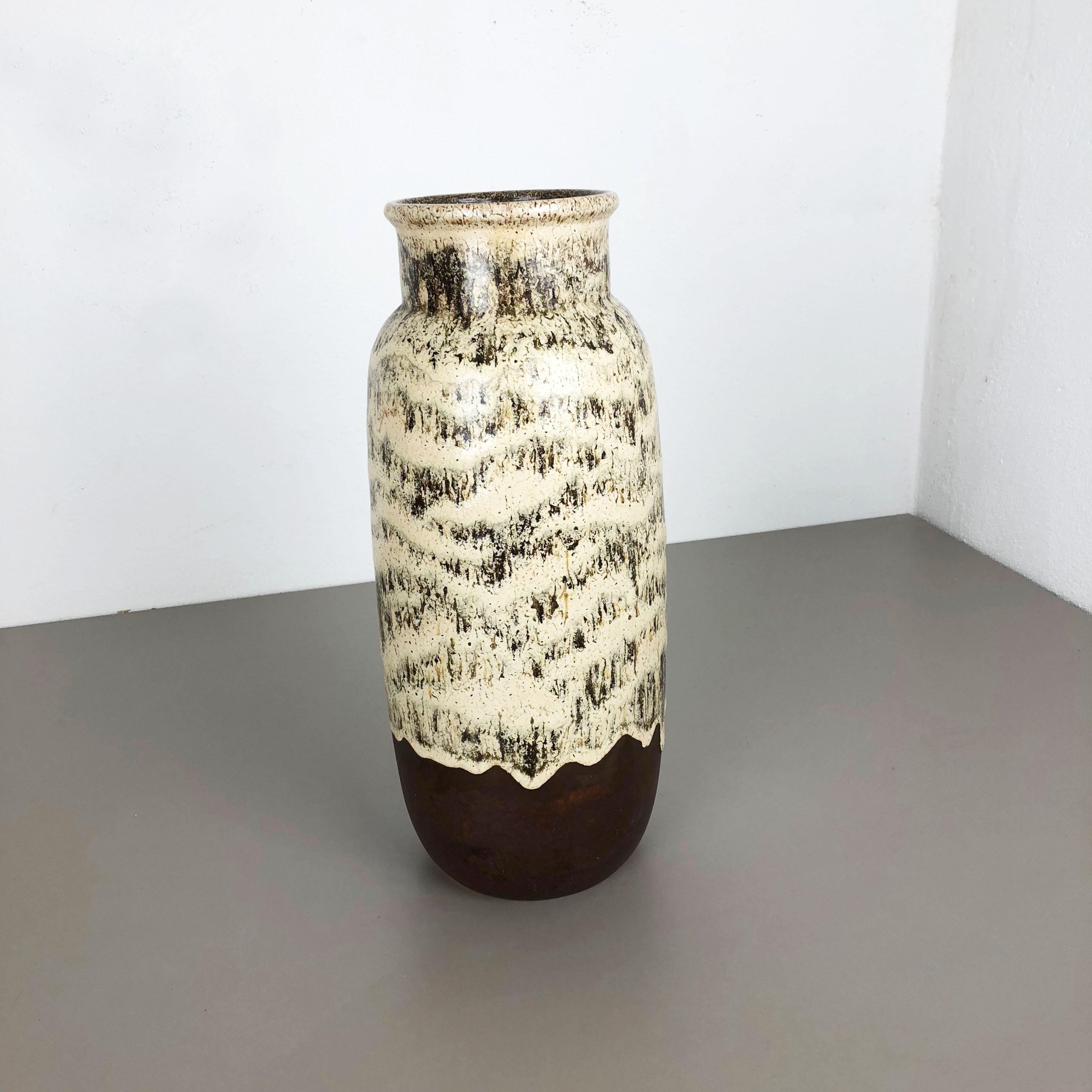Article:

Fat lava art vase XL version


Model: 204-41


Producer:

Scheurich, Germany



Decade:

1970s


Description:

This original vintage vase was produced in the 1970s in Germany. it is made of ceramic pottery in fat lava