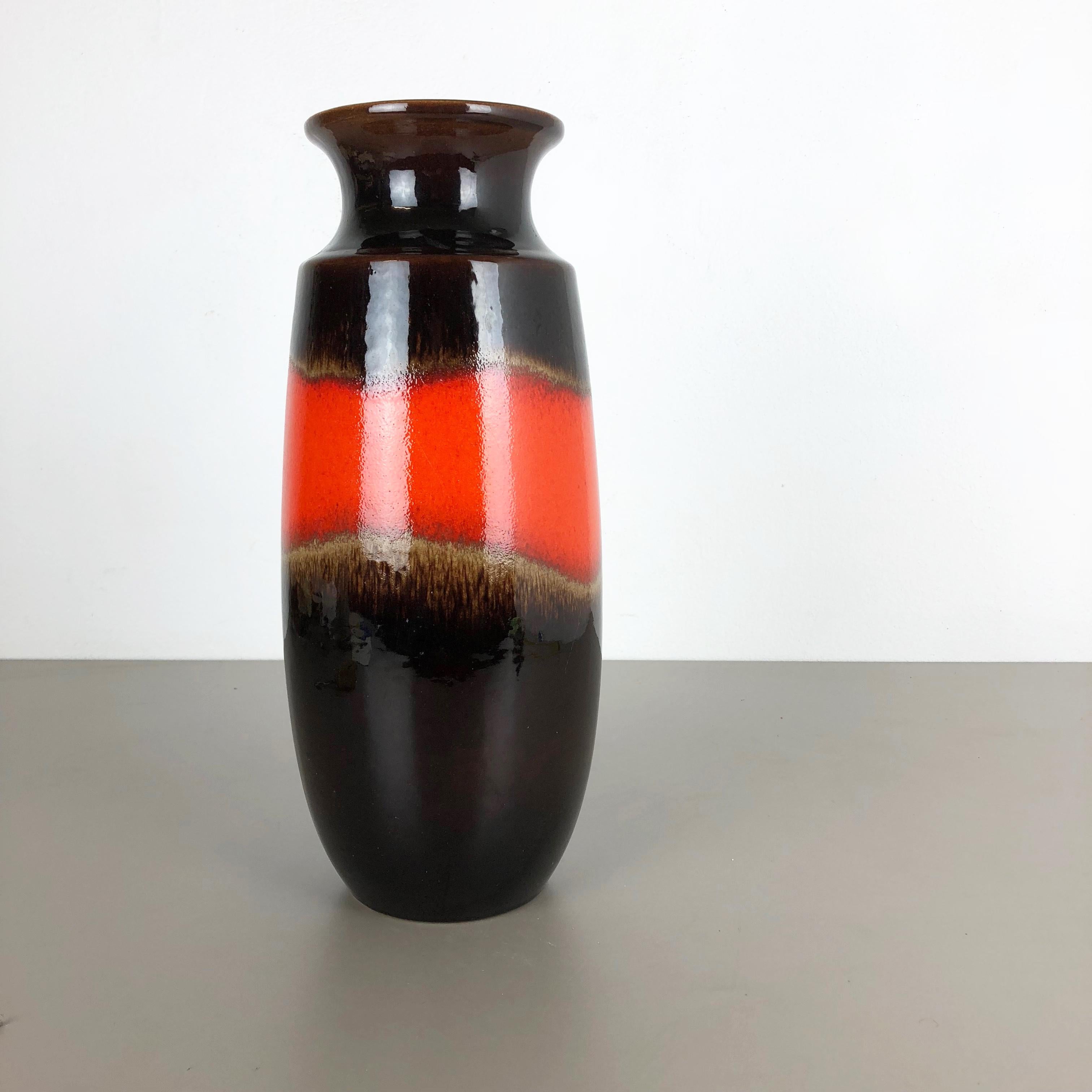 Article:

Fat lava art vase extra large version


Model: 238-41


Producer:

Scheurich, Germany



Decade:

1970s


Description:

This original vintage vase was produced in the 1970s in Germany. It is made of ceramic pottery in
